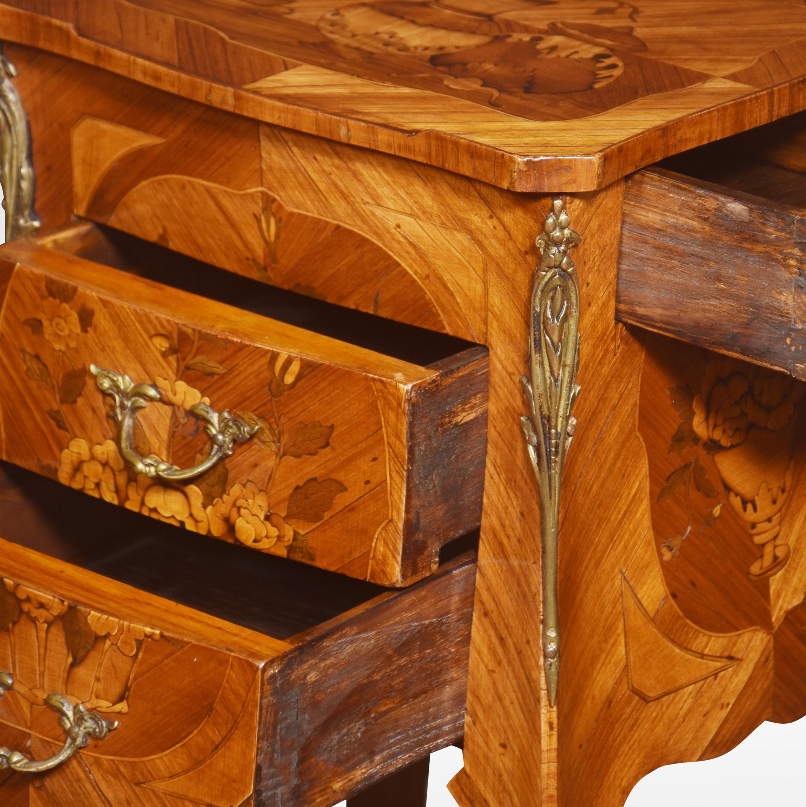 20th Century Pair of marquetry inlaid and gilt metal mounted bedside cabinets