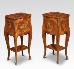 Pair of marquetry inlaid and gilt metal mounted bedside cabinets