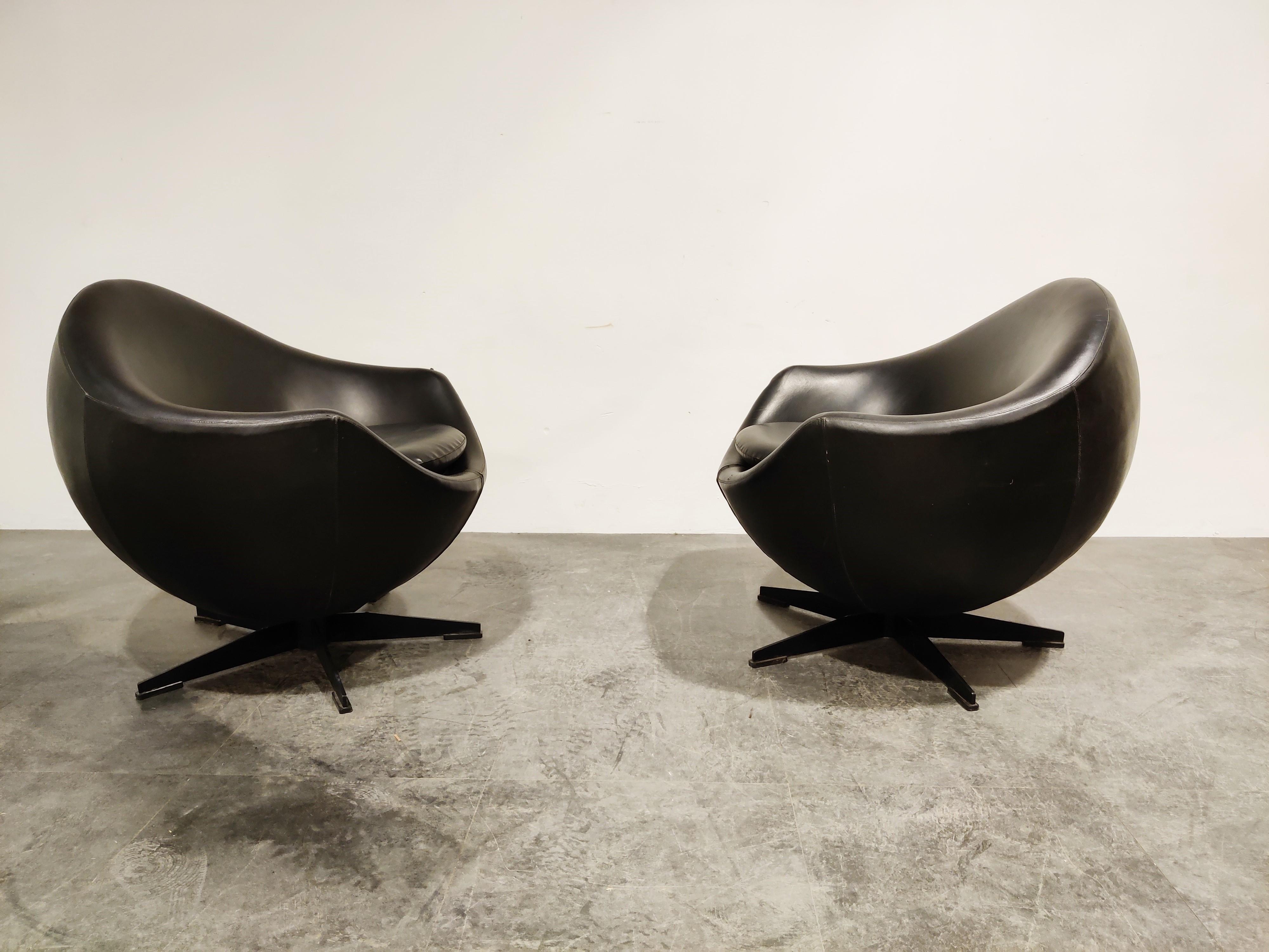 Mid century swivel lounge chairs model 'mars' designed by Pierre Guariche for Meurop.

The chair has a star shaped metal base and a with leatherette upholstered shell.

The chairs are in original condition, with some wear but still great looking