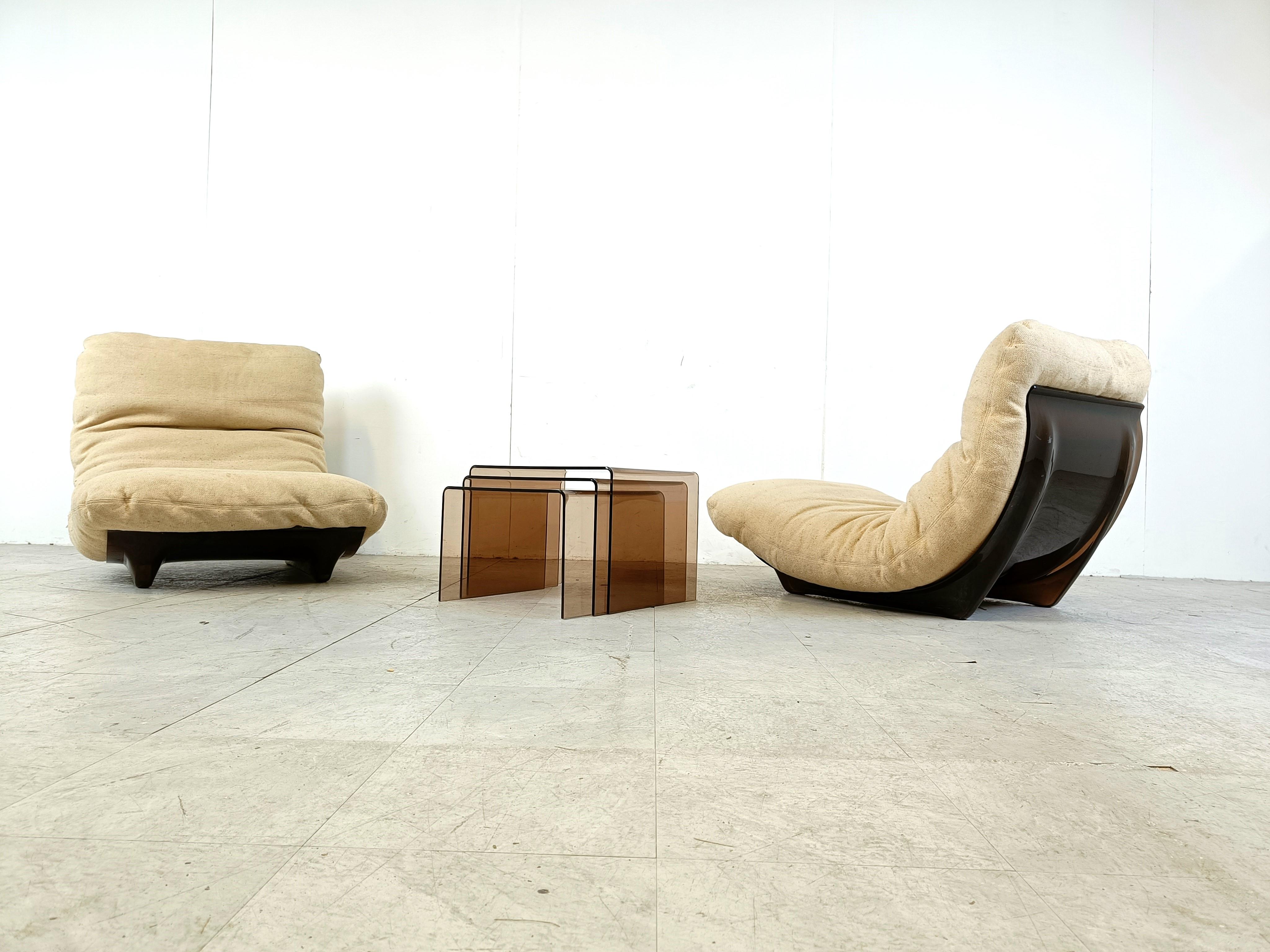 Space Age Pair of Marsala lounge chairs with matching tables by Michel Ducaroy 