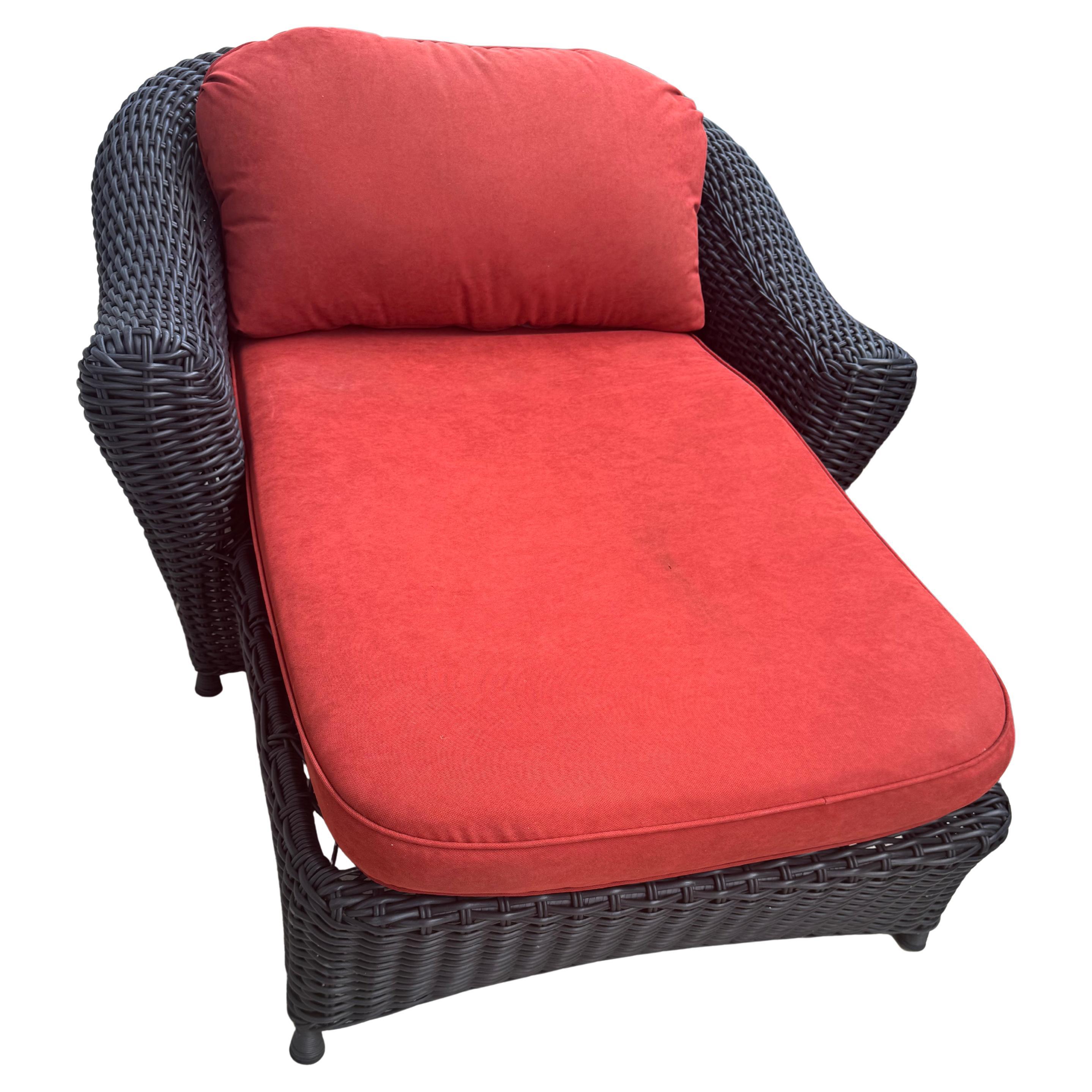 This is a beautiful charcoal chaise lounge by Martha Stewart. These chairs feature intricate wicker weaving. The chaise is labeled and exhibits the classic design elements associated with Martha Stewart. 
Dimensions:
Width: 36