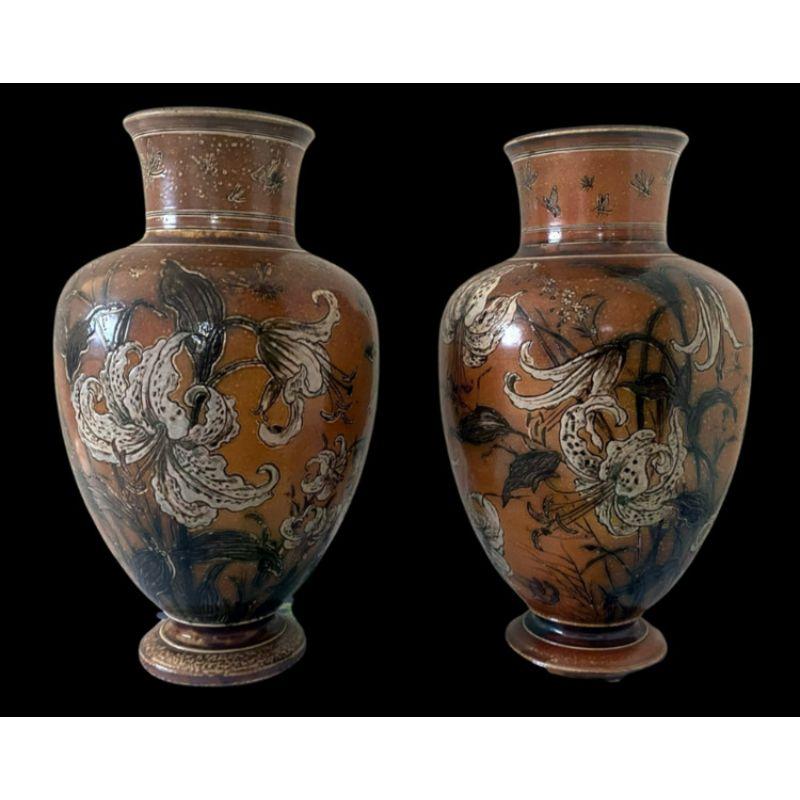 Robert Wallace Martin. Pair of Vases decorated with Lilies, Butterflies and Insects.

Firing crack to the base of one vase

Dated 1892

Dimensions: 24cm high

Complimentary Insured Postage
14 Day Money Back Guarantee
BADA Member – Buy the Best from
