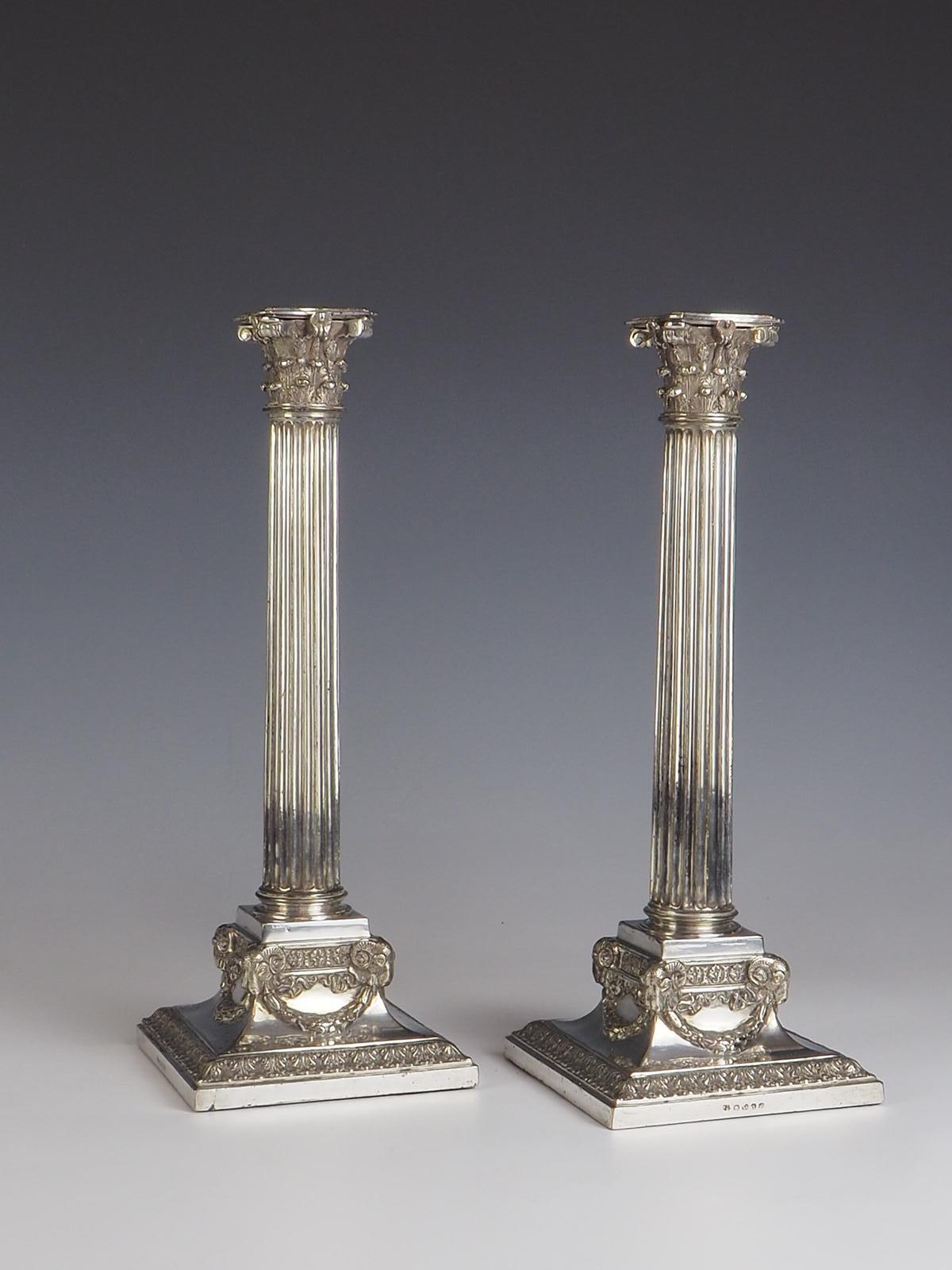 Indulge in the timeless elegance of this exquisite pair of Martin Hall & Co Silver Plate Candlesticks, crafted circa 1890. These candlesticks are a testament to the impeccable craftsmanship of the era, boasting intricate detailing that will