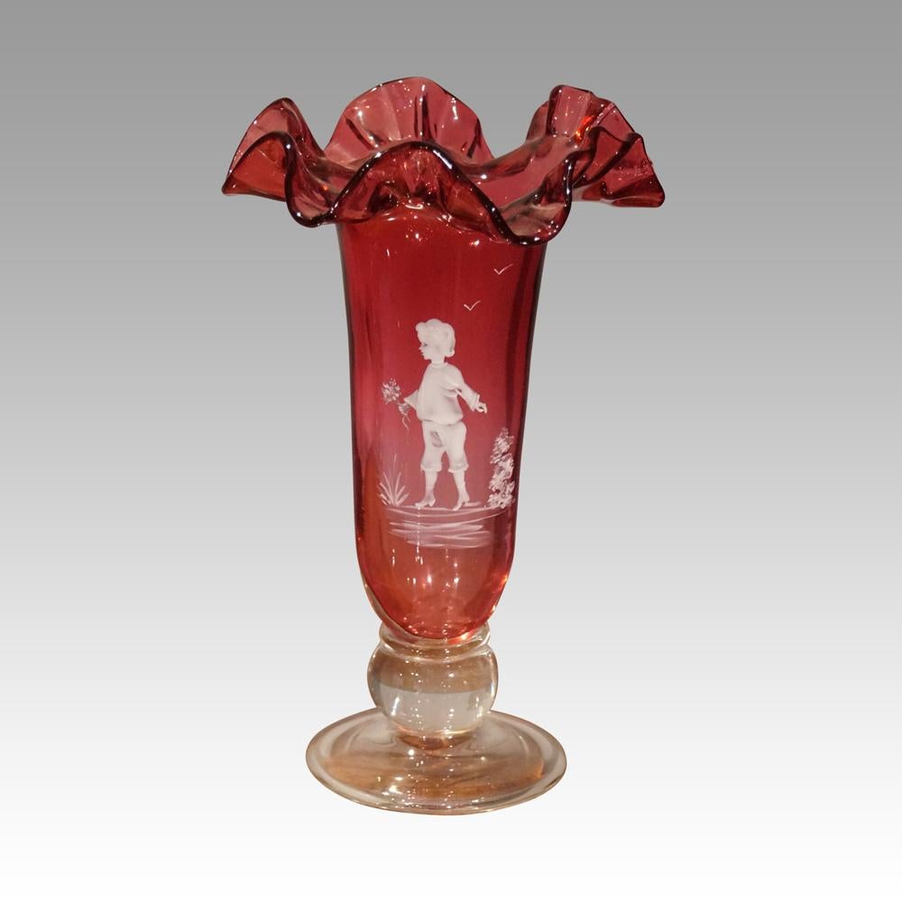 Pair of Mary Gregory cranberry glass vases
This pair of pair of Mary Gregory cranberry glass vases were made circa 1900.
This genre of work with the delightful white enamel on glass is known as Mary Gregory. It was thought that Mary Gregory who