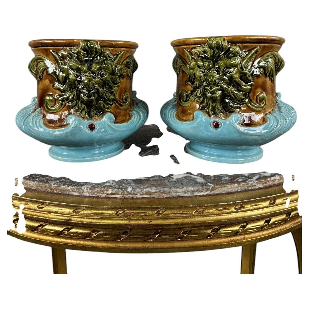 Pair Of Mascaron-decorated Earthenware Cachepots, 19th Century For Sale