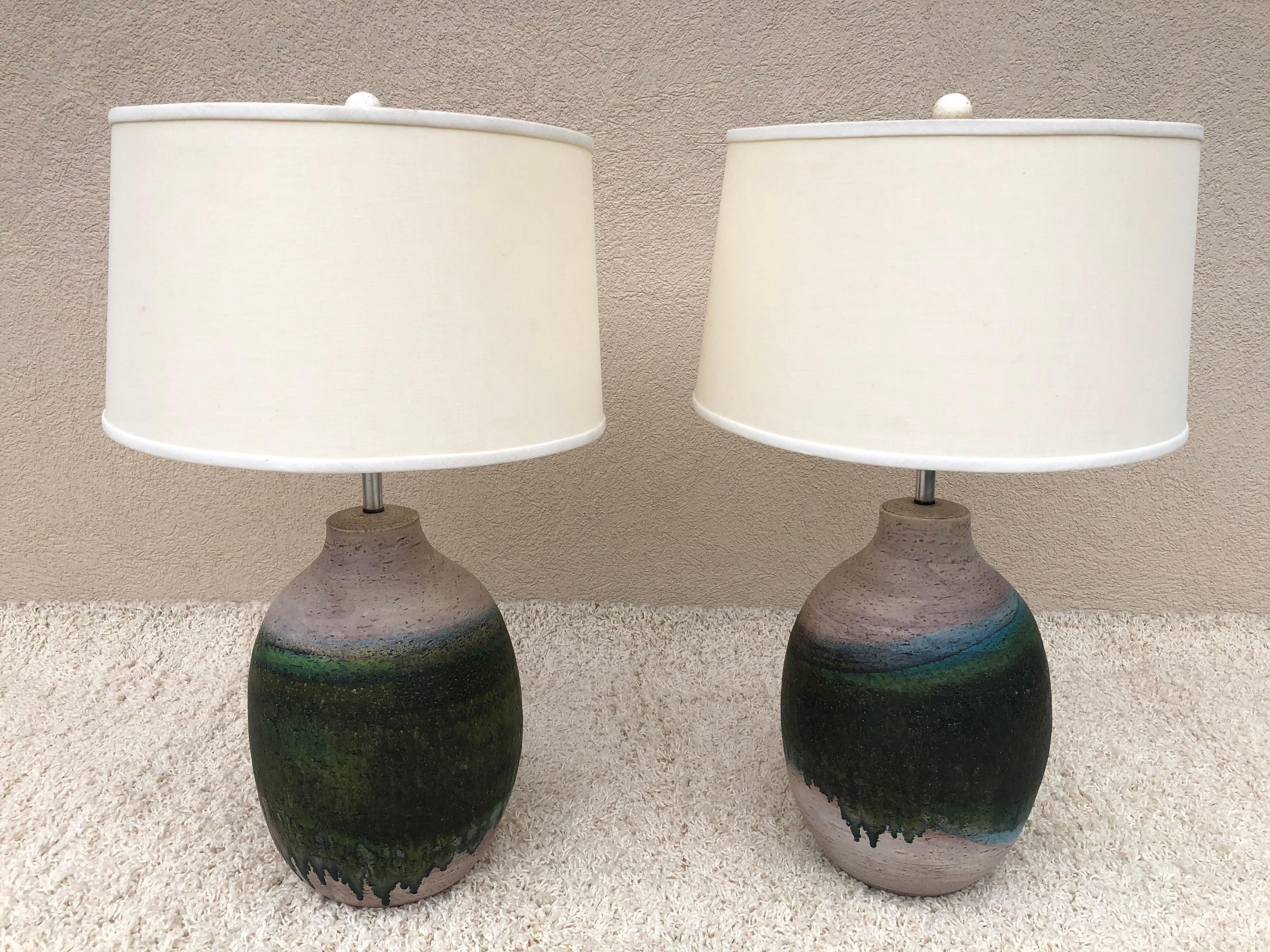Pair of extra large Marcelo Fantoni signed ceramic hand glazed lamps, turquoise and green brown and crème background, top quality made with original harps which are adjustable mechanism to make very tall, heavy ceramic ball finial, rewired and felt
