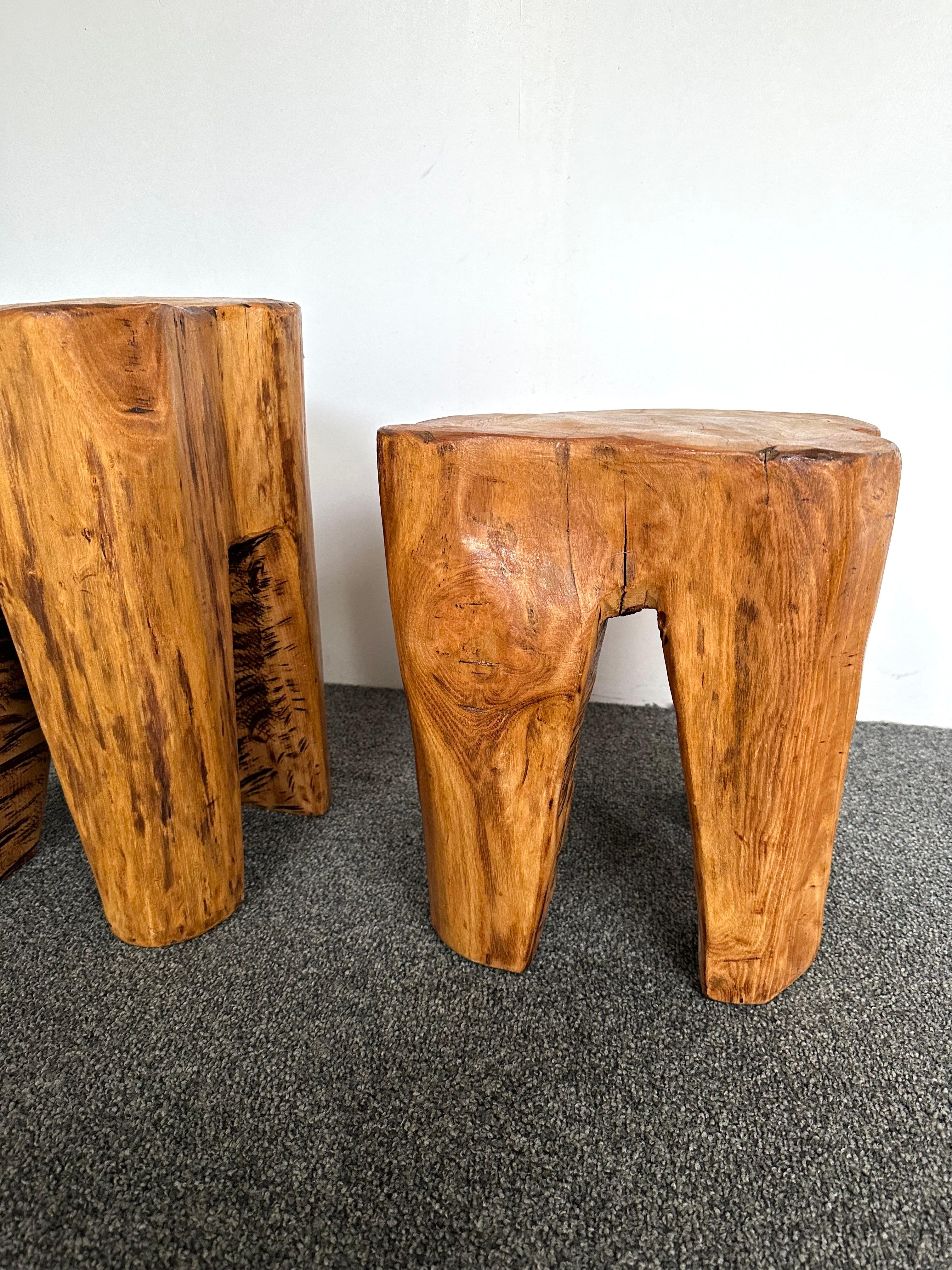 Mid-Century Modern Brutalist pair of or set of 2 side end low coffee cocktail tables or gueridon or small stools in massive walnut wood. Design in the mood of Alexandre Noll, Pierre Chapo, Charlotte Perriand, Le Corbusier Pierre Jeanneret, Jean