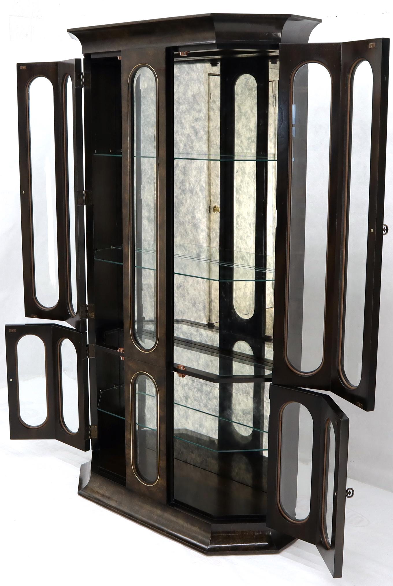 Pair of Mastercraft Mid-Century Modern show cases curio cabinets with smoked mirrors background.