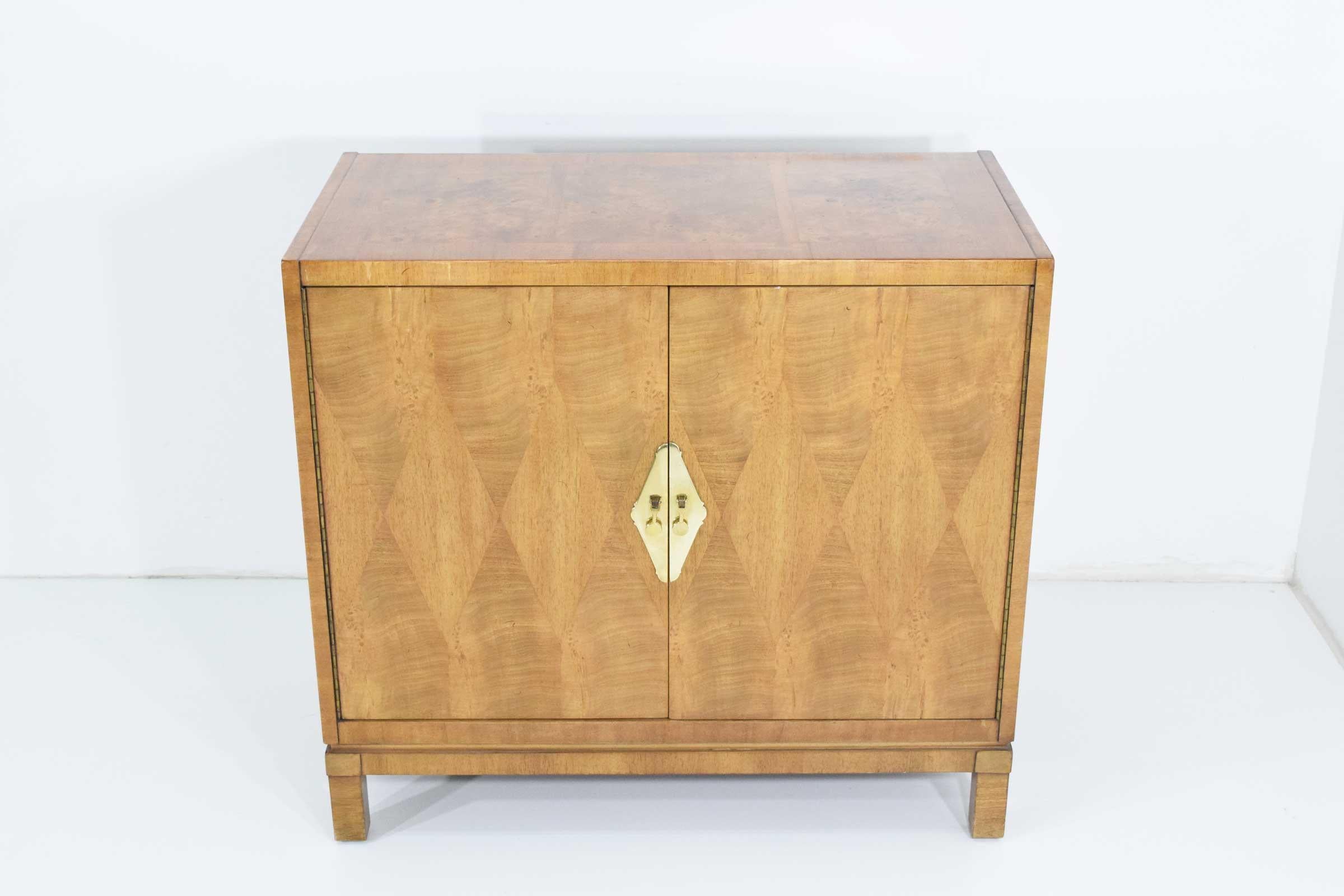 Beautiful inlay wood on top, sides and front. Brass hardware. One drawer on top and a shelf underneath. Mahogany with a burl wood.