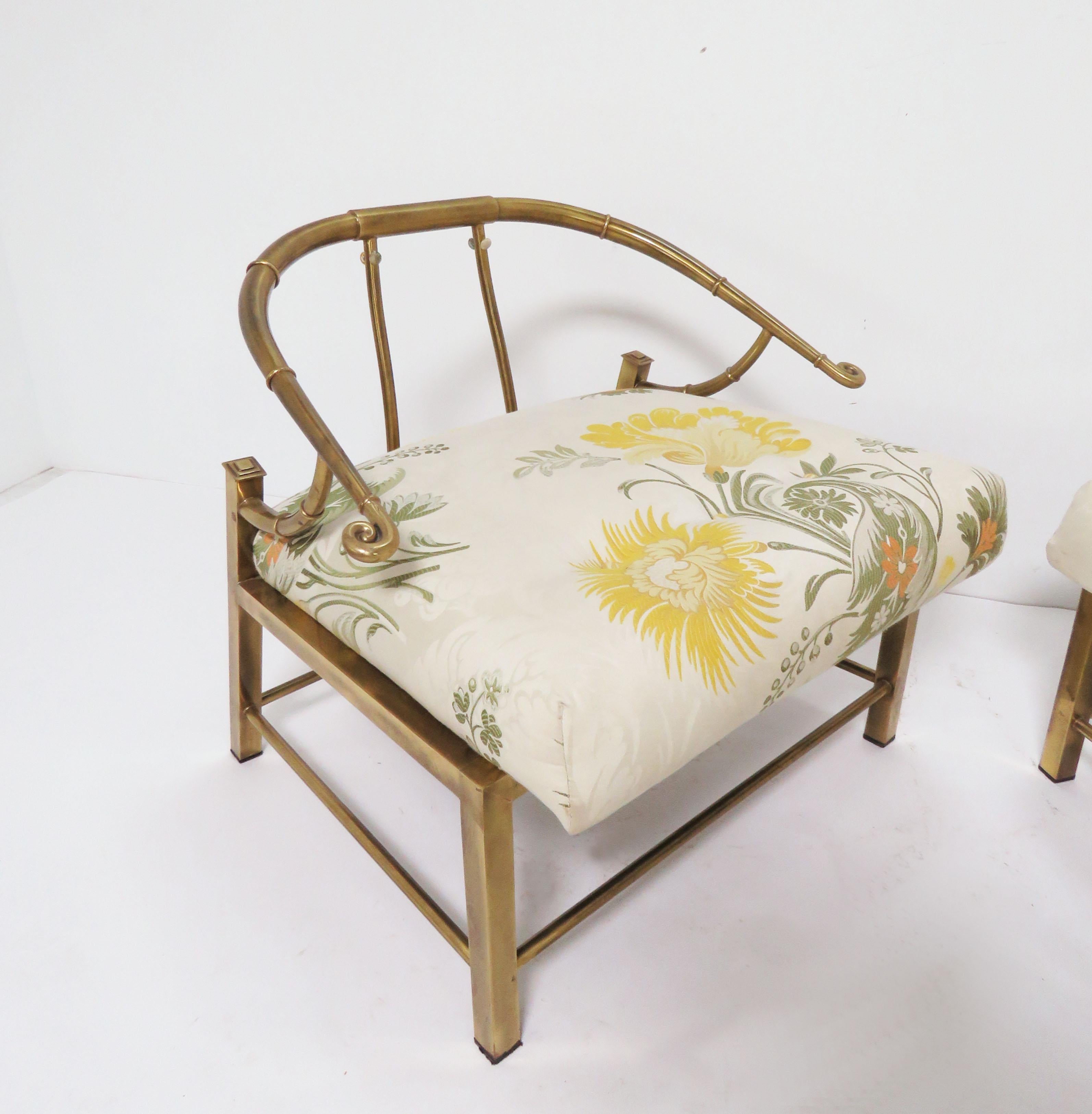 Pair of brass Hollywood Regency lounge chairs in chinoiserie inspired by Chinese dynastic furniture, designed in the early 1960s by the American interior decorator Charles Pengelly for his private Miami clients. These classic low slung chairs, made