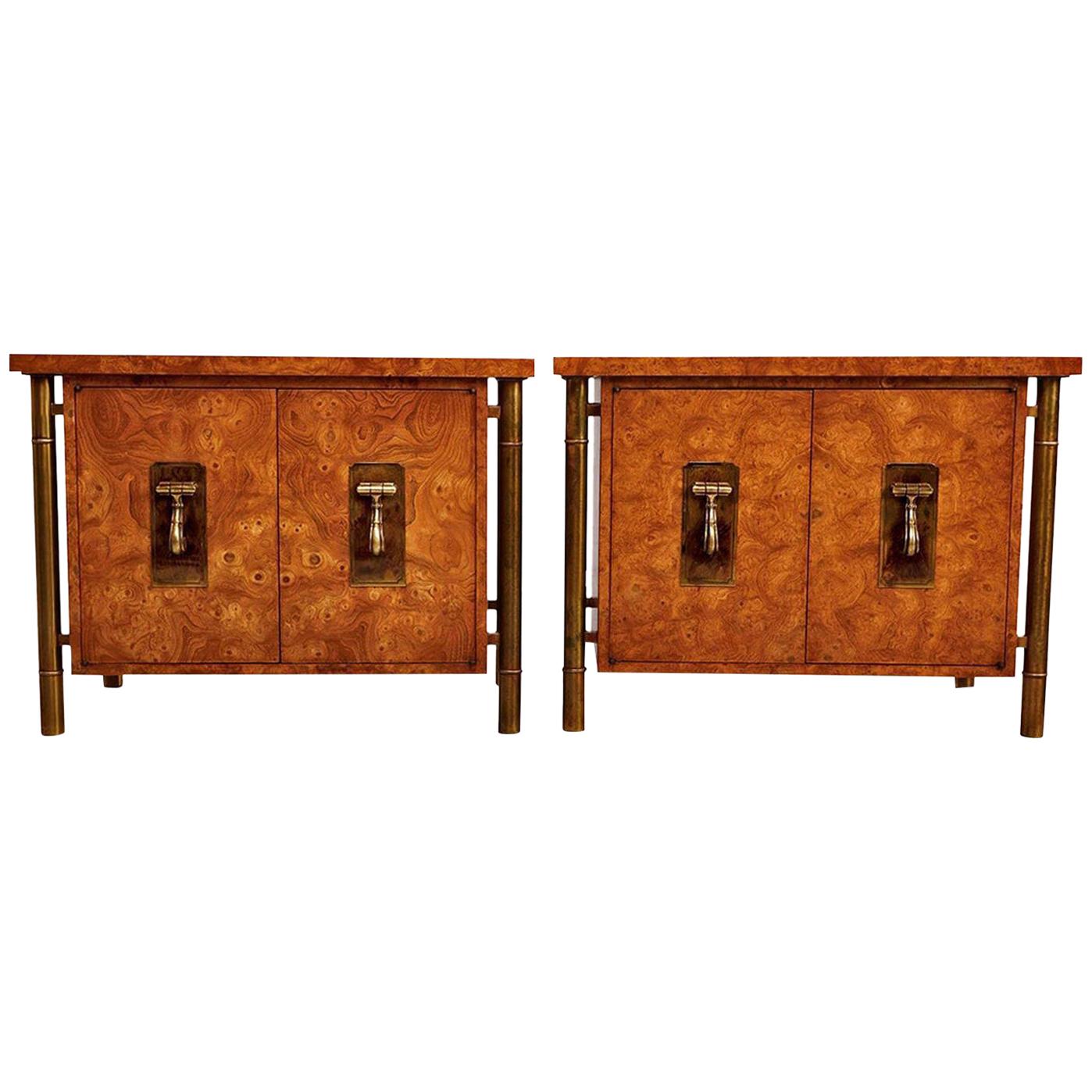 Breathtaking pair of burl wood and brass Mastercraft nightstands. Four tubular outer skeletal brass support legs create a floating effect for each cabinet. The columns are fashioned in the style of bamboo stalks to add an Eastern flare. Hollywood
