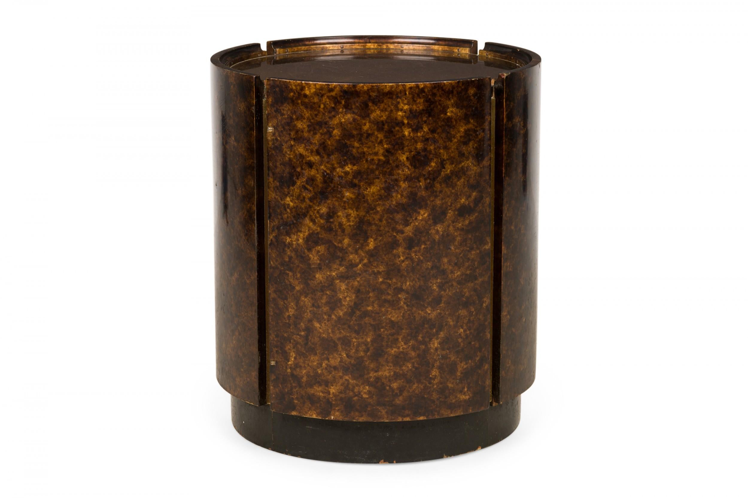 PAIR of American mid-century drum-form end / side tables with four oil drop lacquer panels around the side with narrow cutouts containing brass strips, resting on a circular pedestal bases. (MASTERCRAFT)(PRICED AS PAIR)