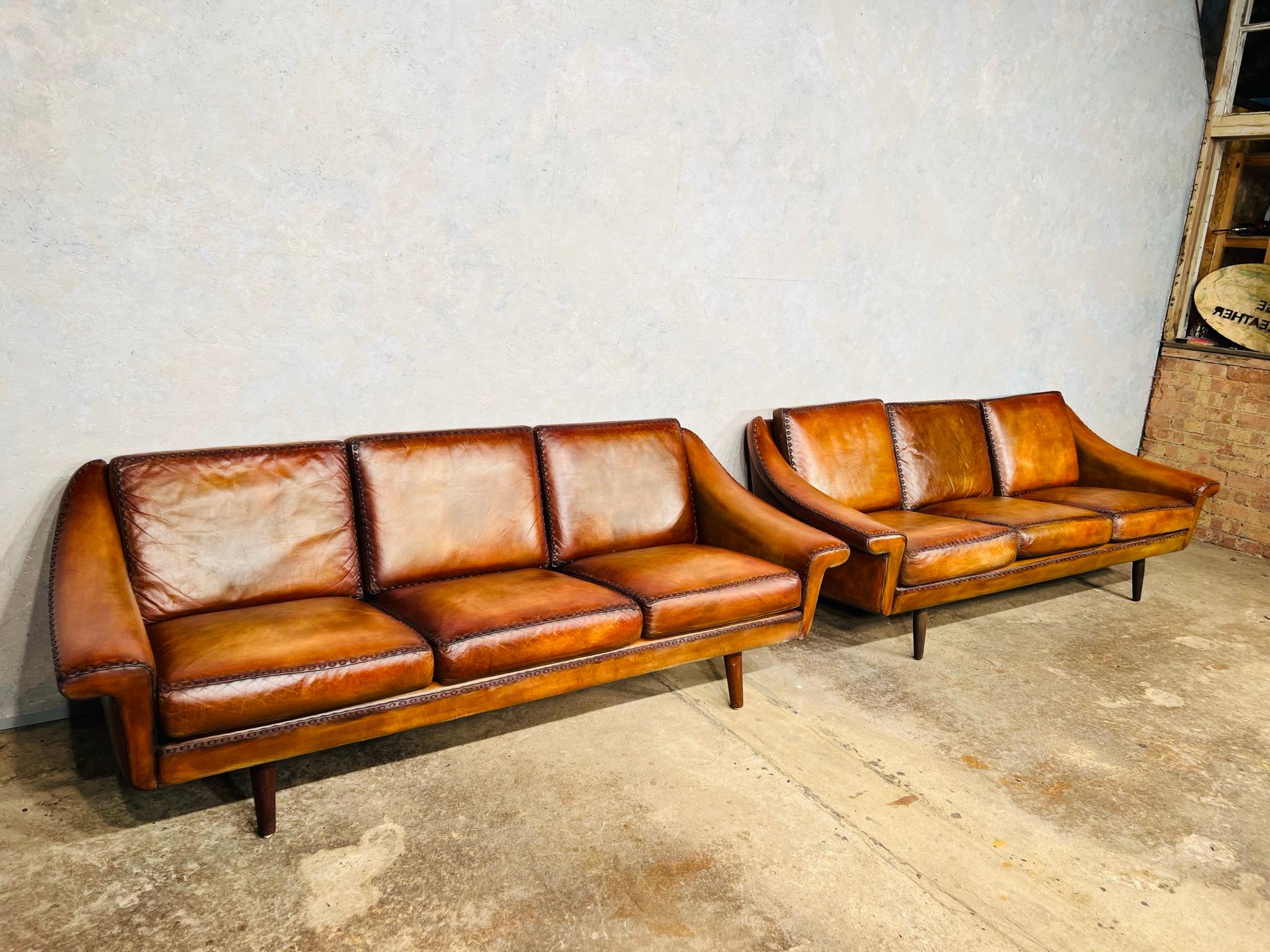 A Pair of Matador Sofas by Aage Christiansen for Eran dating 1960s.

Great to find a matching pair, the colour and patina on these is exceptional.

A great design and shape, Aage Christiansen took the inspiration from a Matadors hat, the quality and