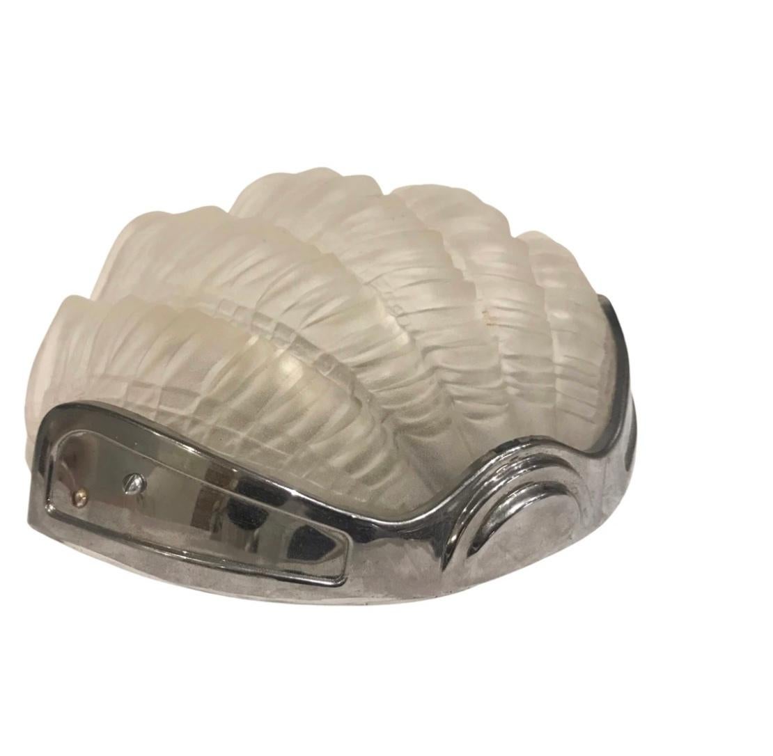 A beautiful pair of opaque Art Deco Shell Wall Lights with chrome backplates in very good condition, no pitting or scratches to the frames. The opaque shells sit firmly in the backplate, secured by 2 chrome fitments. The backplates screw neatly and