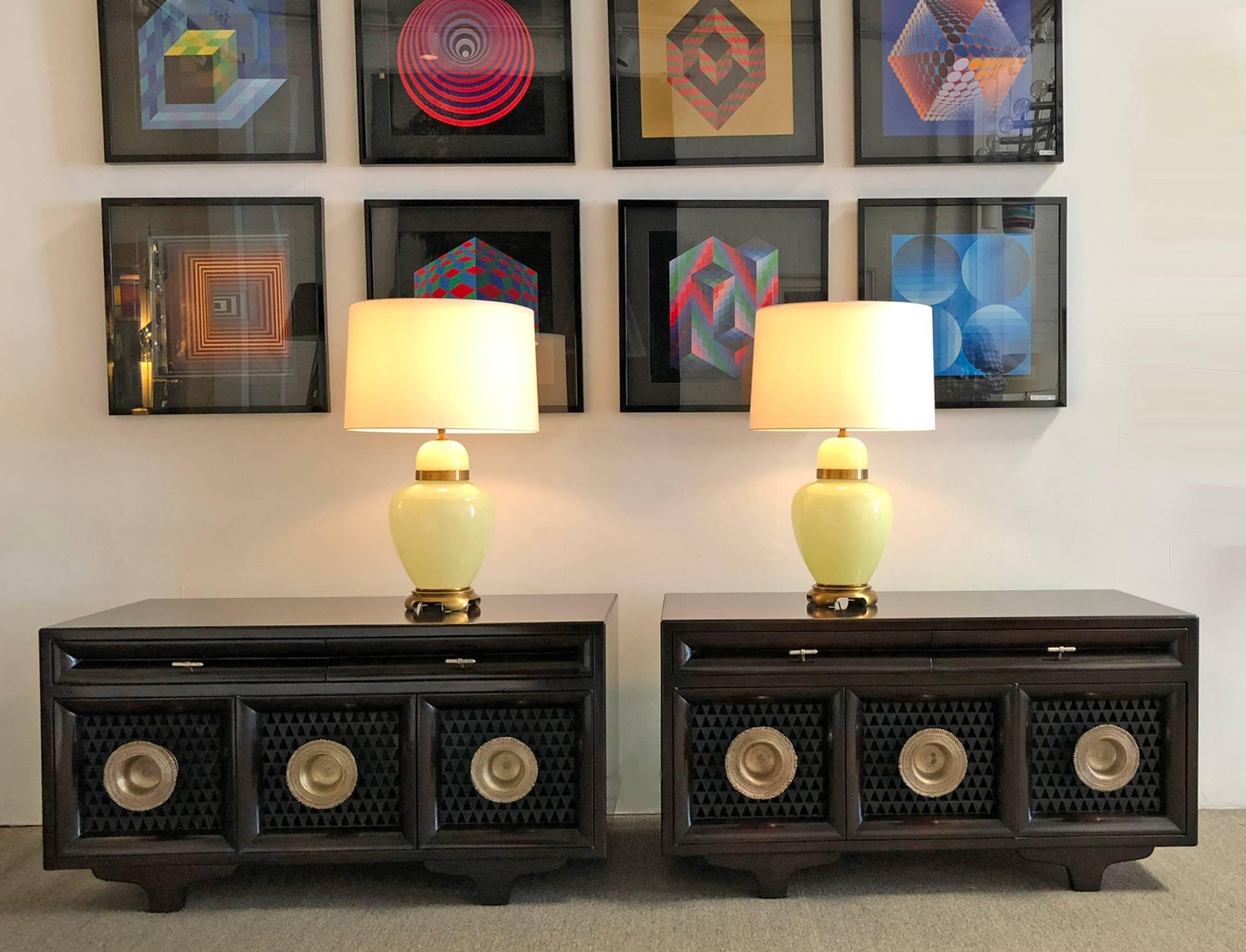 Pair of matching custom cabinets, nightstands or end tables. From a Beverly Hills, California home. Featuring finished mahogany exteriors, original blue interiors and backs, silvered pulls, and perforated doors. Top quality materials and design.