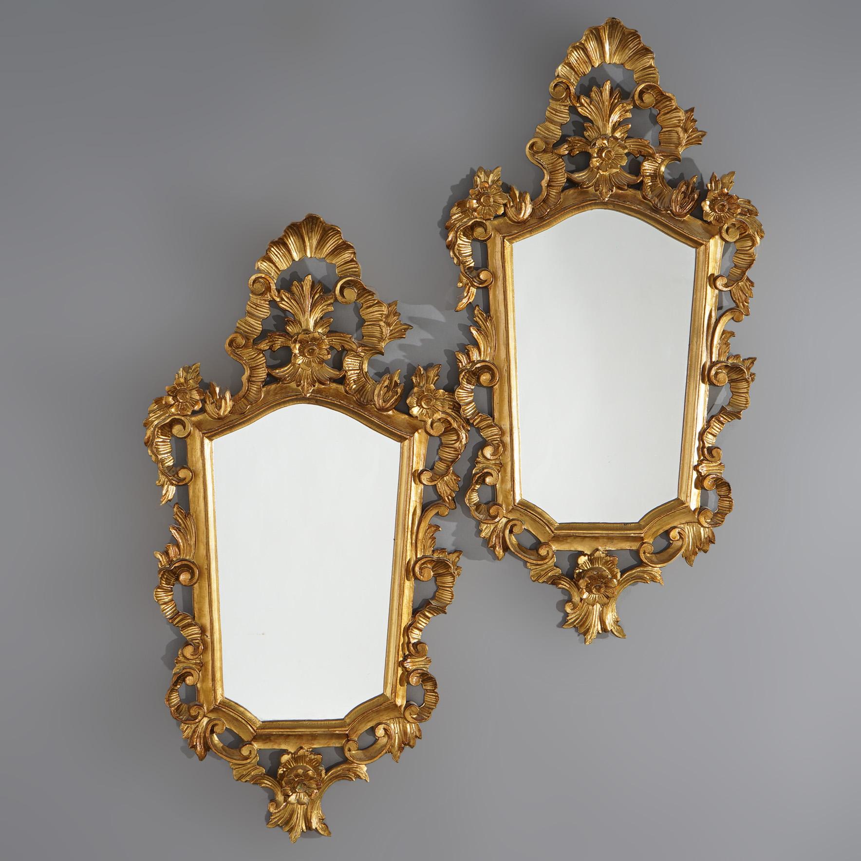 Pair of Matching French Louis XIV Style Giltwood Mirrors with Pierced Foliate & Floral Frames C1930

Measures- 32.75''H x 17''W x 2.5''D