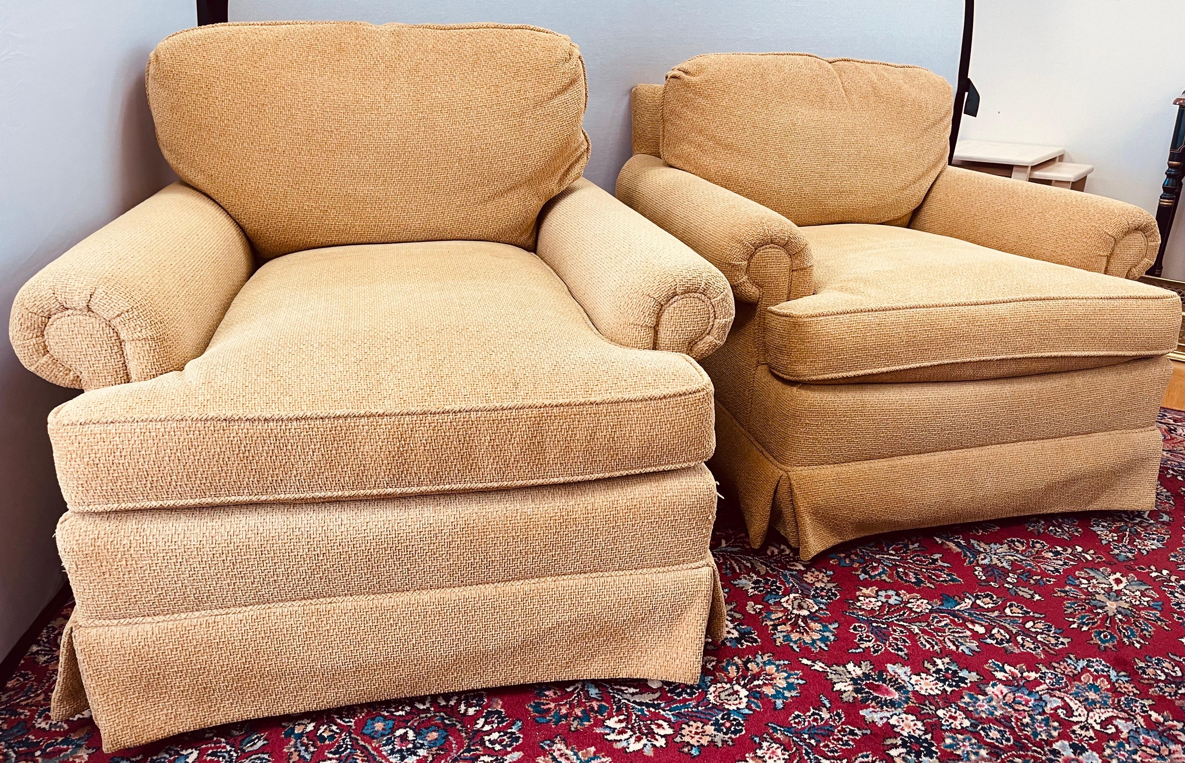 Rare pair of large scale 360 degree swivel reading chairs with great scale and better lines.  Extremely comfortable and made in Hickory, N.C. by Charles Stewart Furniture.