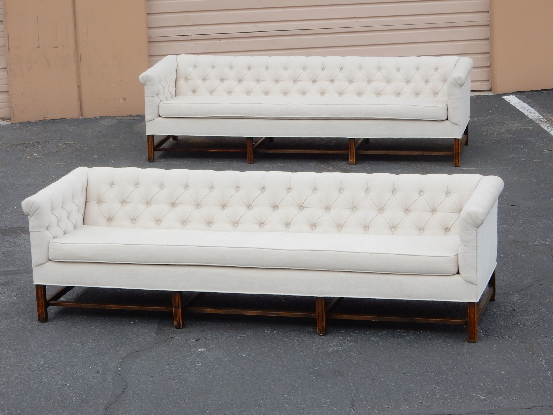 Pair of fabulous midcentury sofas in the style of Edward Wormley design for Dunbar.
circa 1960s. Recent reupholstered in a premium fabric and foam then gently used
afterwards. No stains, holes or damage. Both are solid with no issues.
 