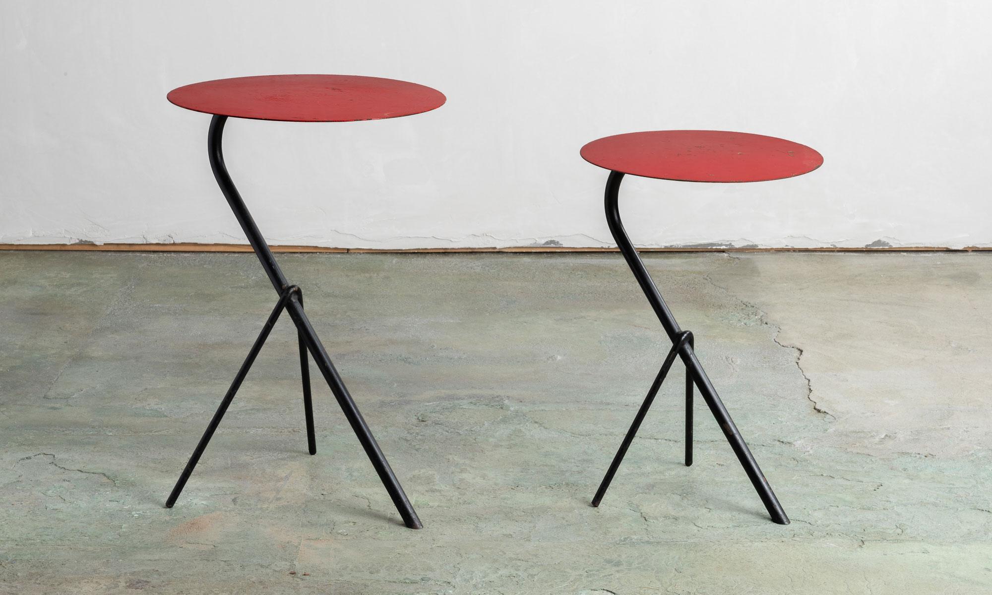 Pair of Matégot side tables, France, circa 1950.

Wonderful form, with original bold paint.

Measures: Large - 13.5