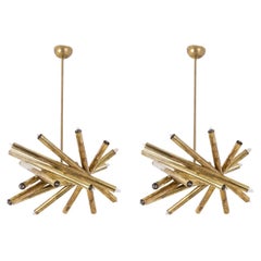 Pair of matte gilded brass chandeliers. Italian work from the 1970s.