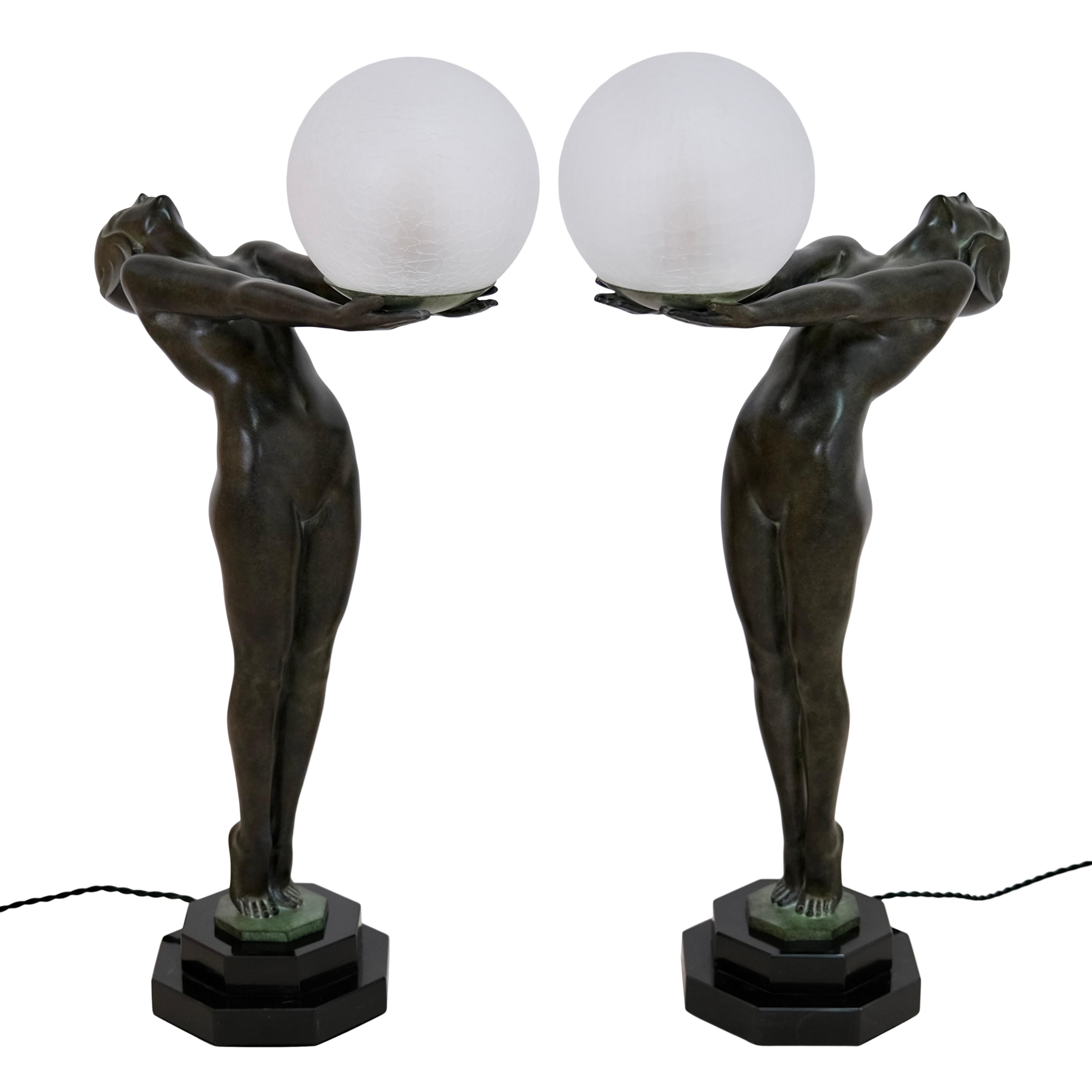 French Pair of Max Le Verrier Clarte Art Deco Sculpture Lamps Nude with a Glass Ball