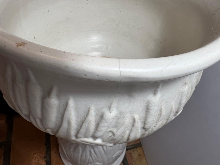 Pair of McCoy Pottery Jardiniere and Pedestals with a Cattail Design