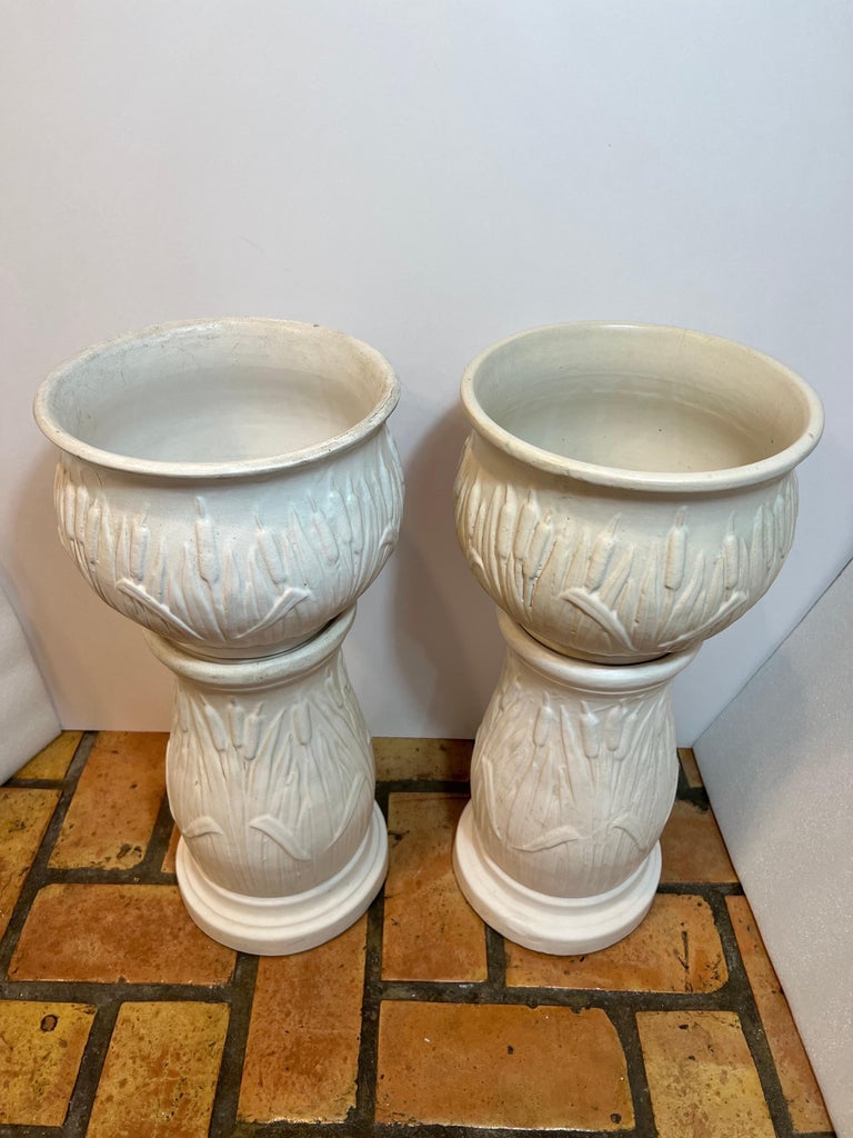 Pair of McCoy Pottery Jardiniere and Pedestals with a Cattail Design