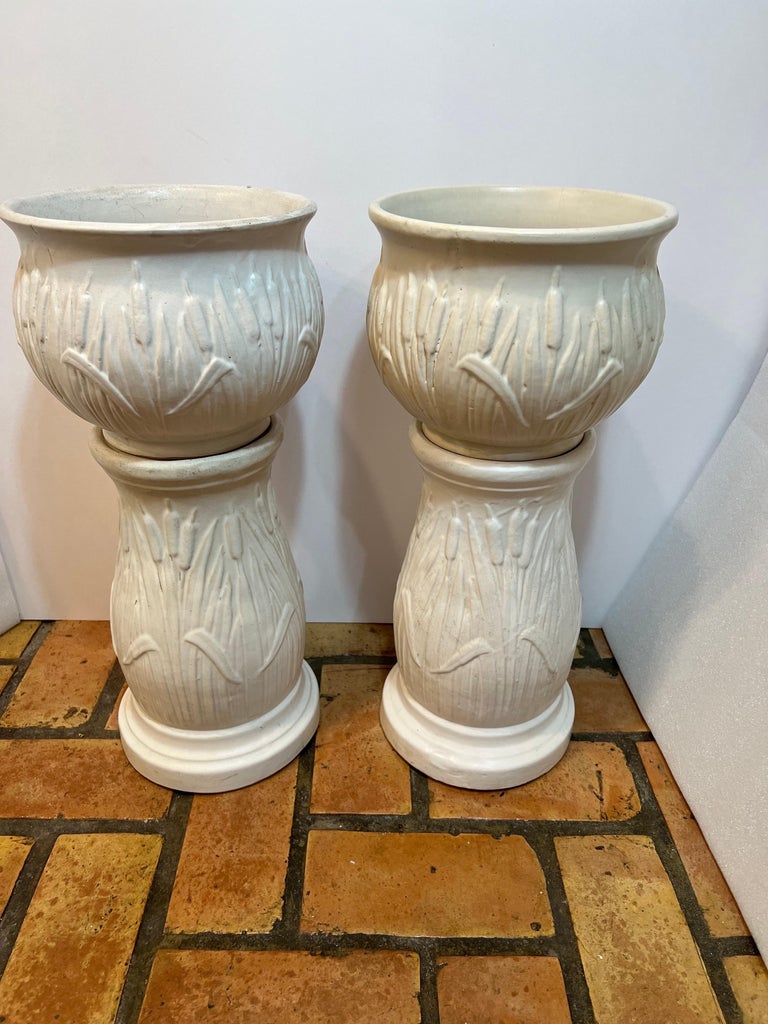 Pair of McCoy Pottery Jardiniere and Pedestals with a Cattail Design