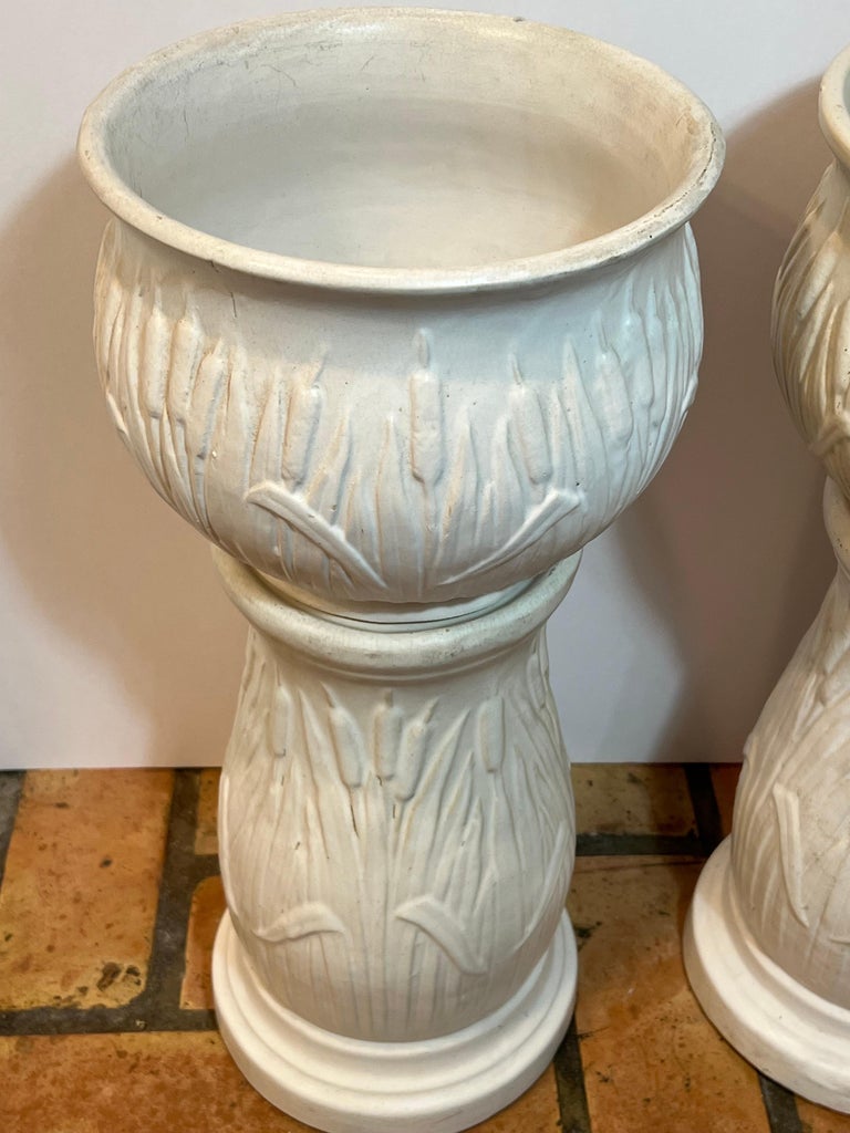 Pair of McCoy Pottery Jardiniere and Pedestals with a Cattail Design