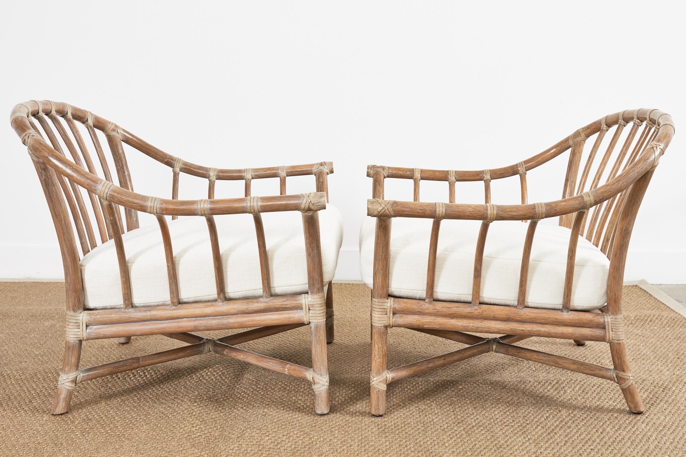 20th Century Pair of McGuire Cerused Rattan Lounge Chairs and Ottoman