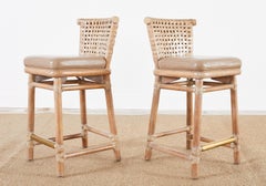 Pair of McGuire Laced Leather Rawhide Cerused Rattan Barstools