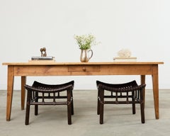 Pair of McGuire Laced Leather Rawhide Rattan Ottoman Stools