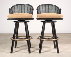 Pair of McGuire Lacquered Rattan Cane Swivel Barstools