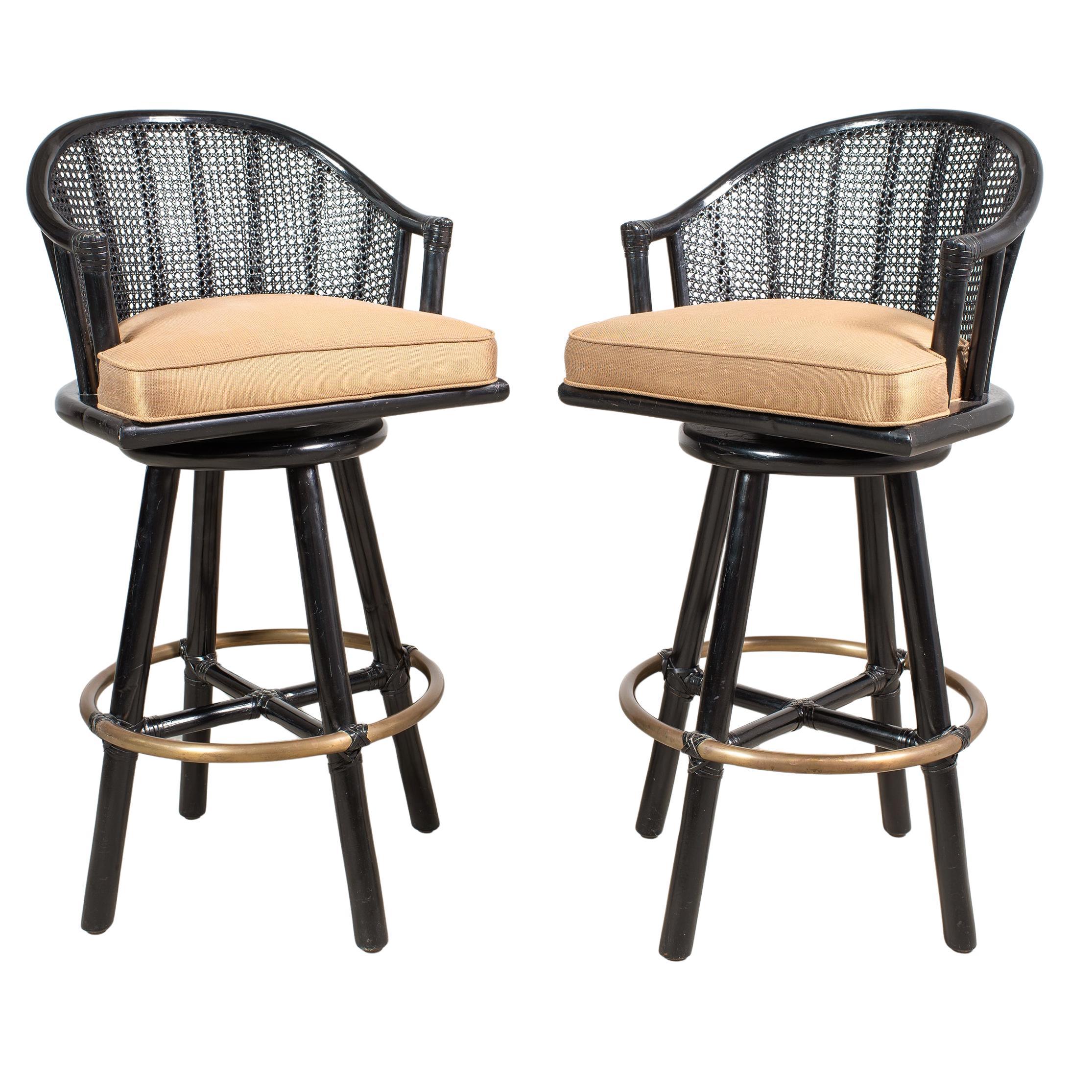 Pair of McGuire Lacquered Rattan Cane Swivel Barstools For Sale