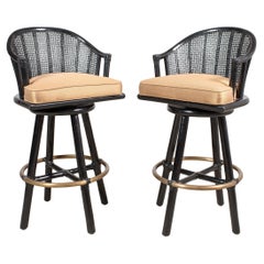 Pair of McGuire Lacquered Rattan Cane Swivel Barstools