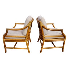 Vintage Pair of McGuire Organic Modern Rattan and Leather Upholstered Armchairs