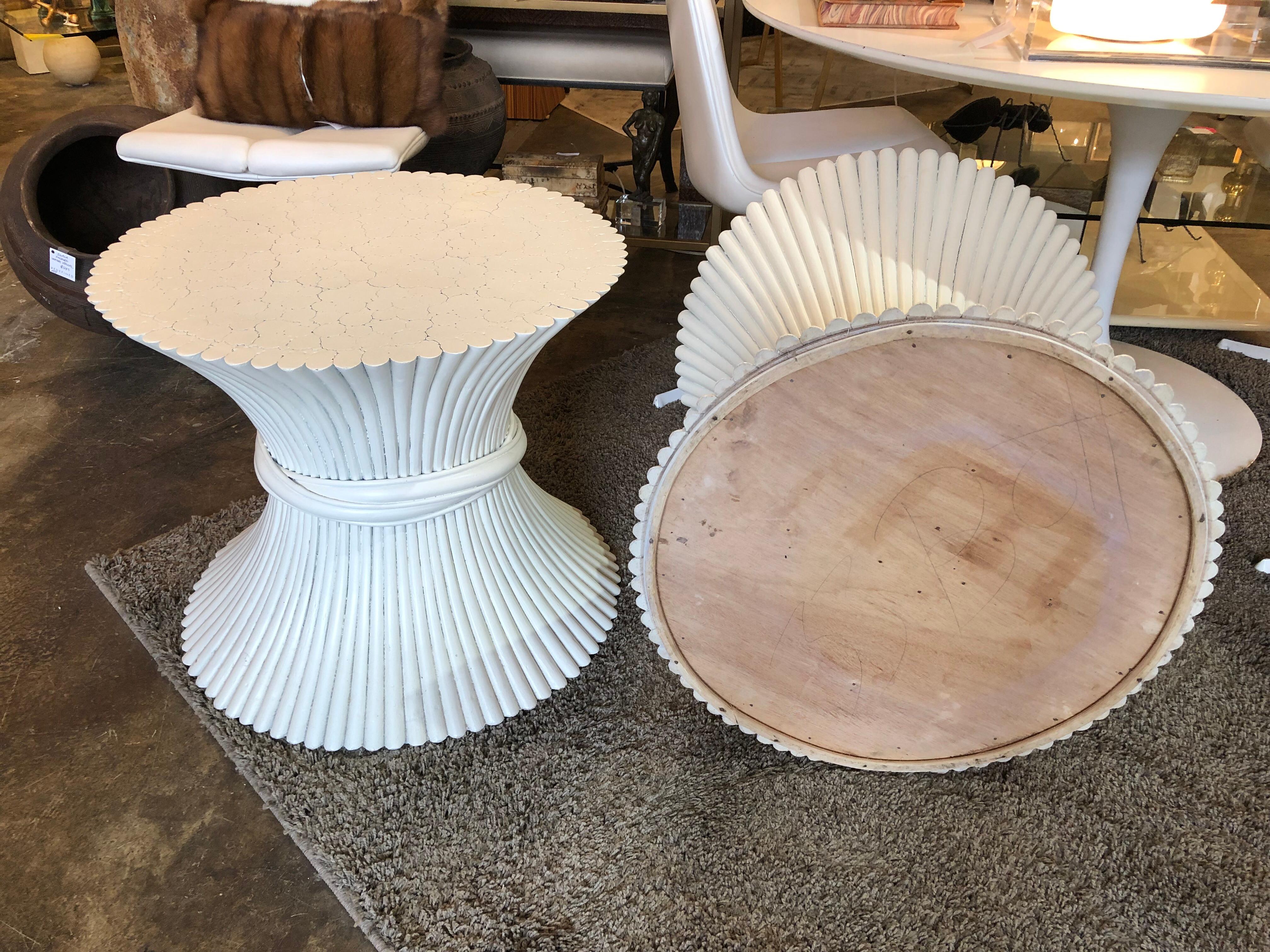 A pair of late 1970s sheaf of wheat side tables by McGuire painted white.
