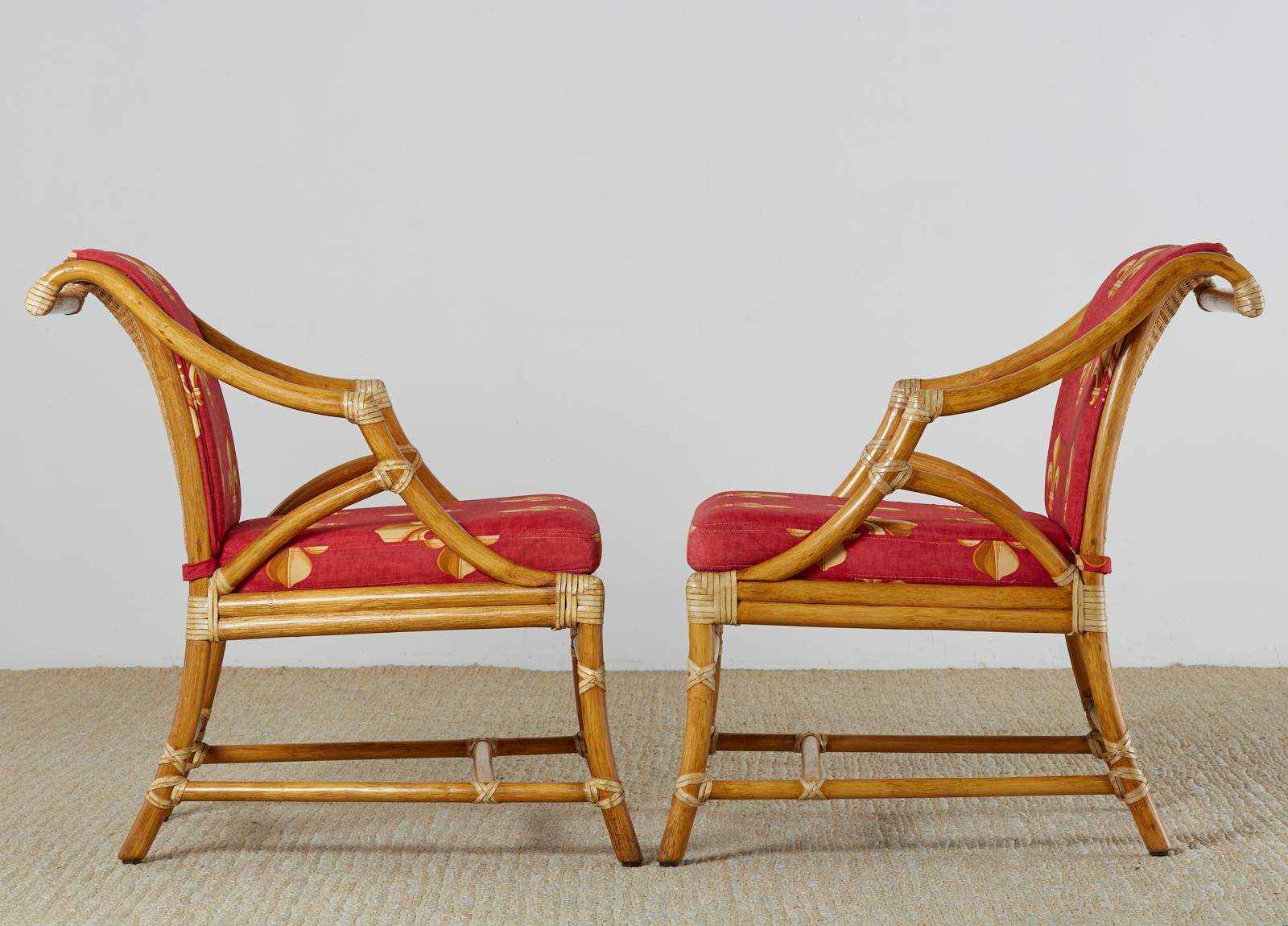 Hand-Crafted Pair of McGuire Rattan and Cane Upholstered Lounge Chairs