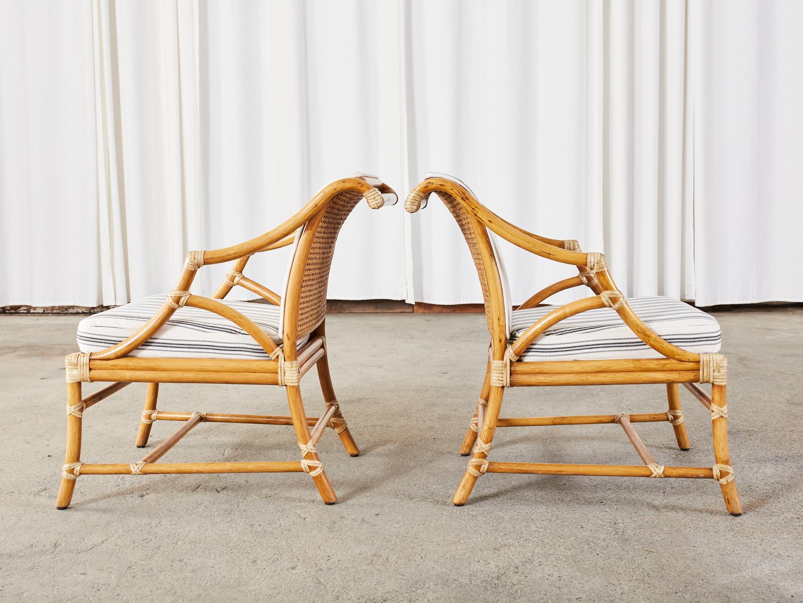 Hand-Crafted Pair of McGuire Rattan and Cane Upholstered Lounge Chairs