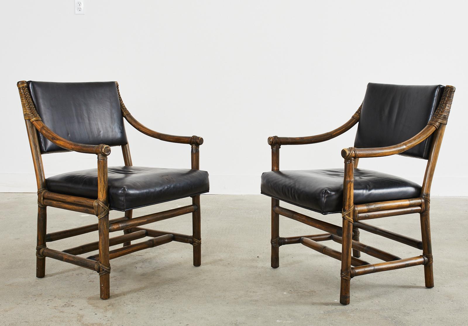American Pair of McGuire Rattan Black Leather Library Armchairs