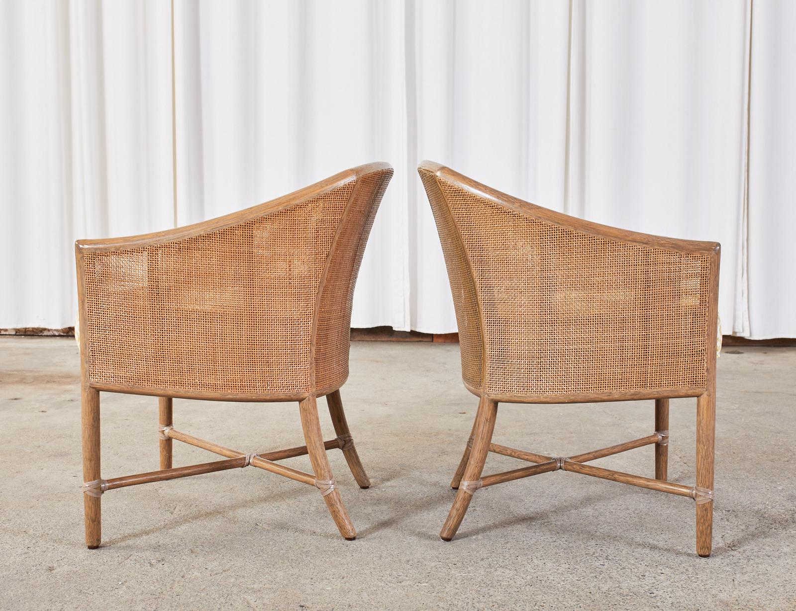 Hand-Crafted Pair of McGuire Rattan Cane Barrel Back Dining Chairs