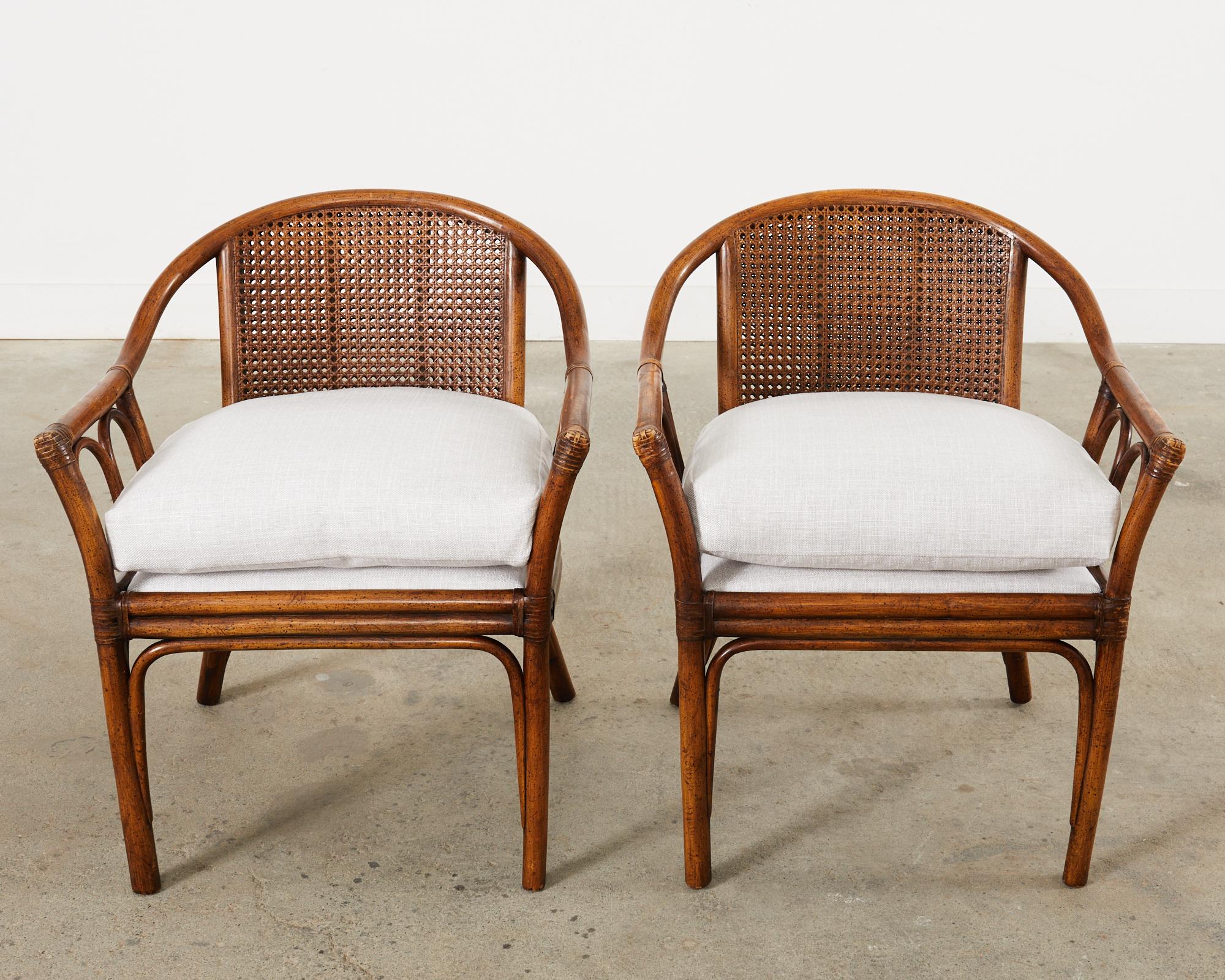 American Pair of McGuire Style Rattan Cane Barrel Back Armchairs For Sale