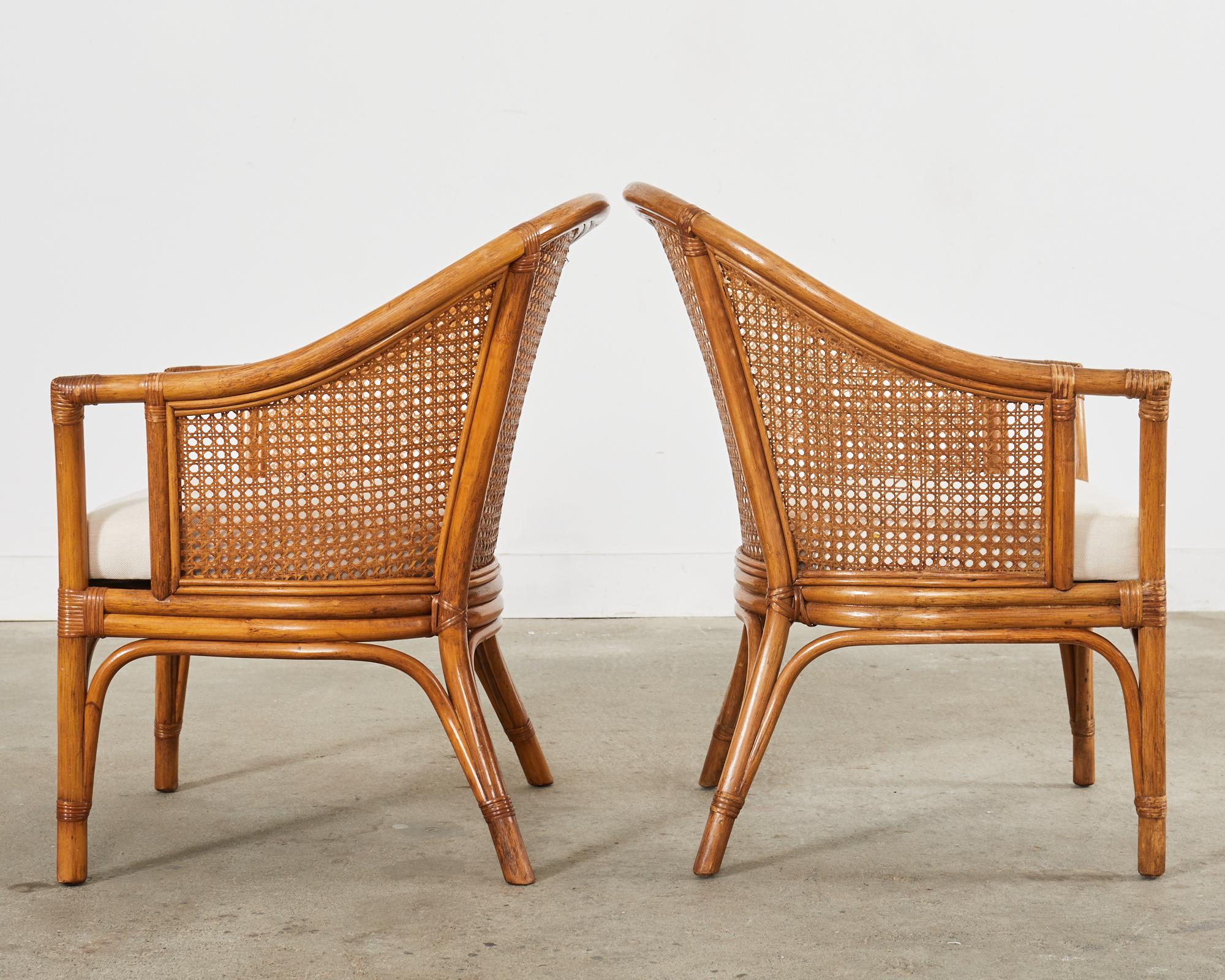 20th Century Pair of McGuire Style Rattan Cane Barrel Back Armchairs For Sale