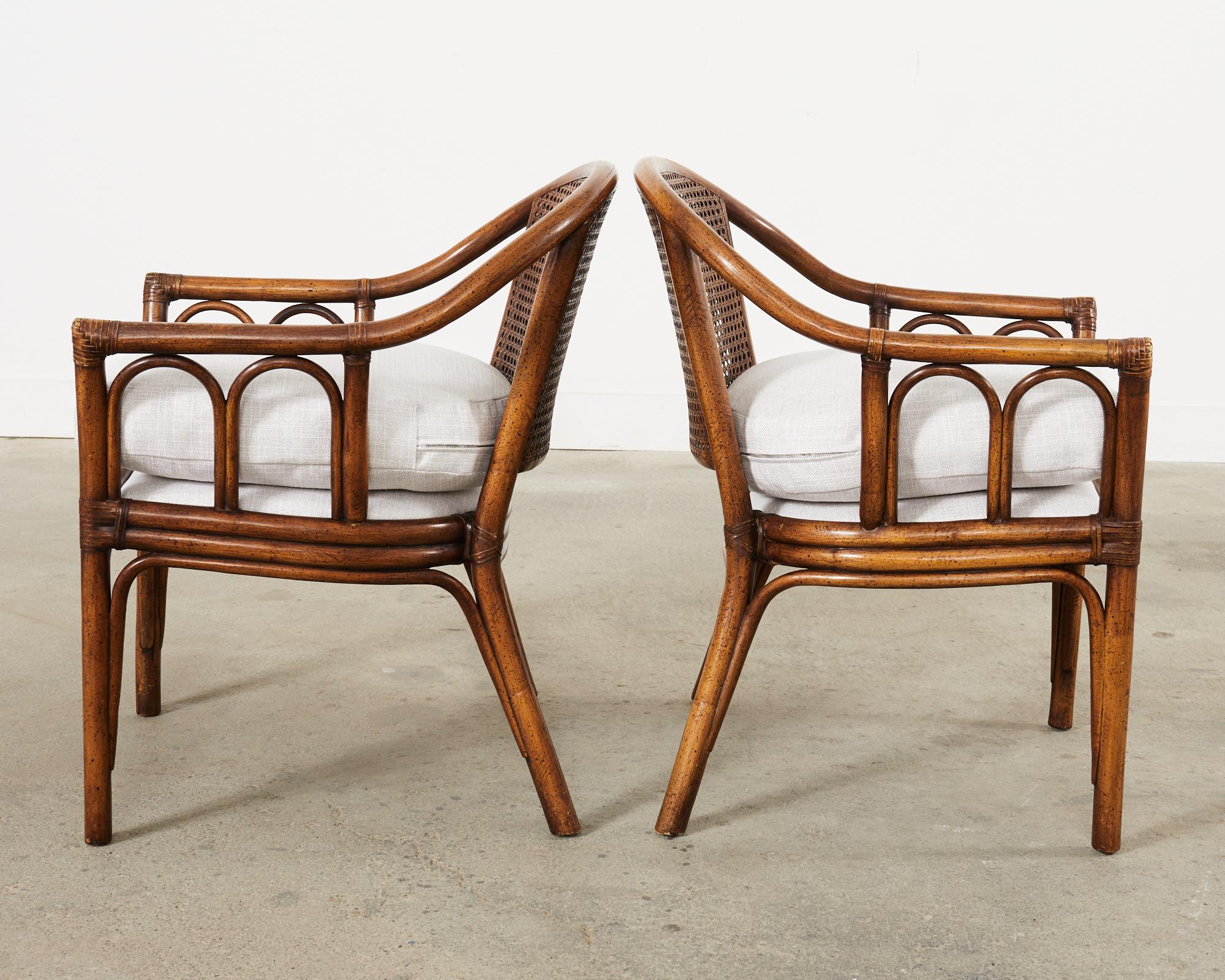 Leather Pair of McGuire Style Rattan Cane Barrel Back Armchairs For Sale