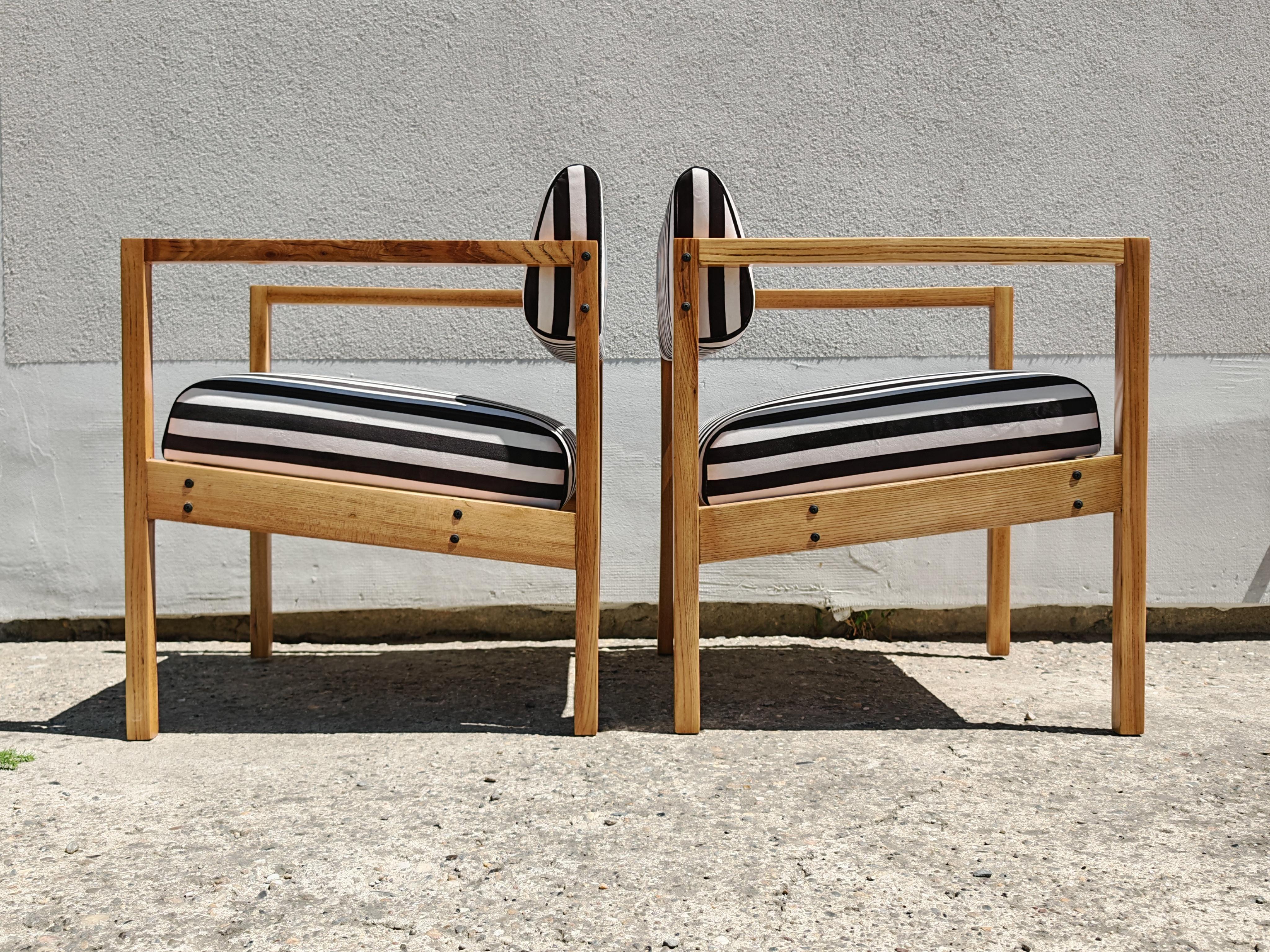 Slovenian Pair of MCM Armchairs in solid Ash designed by Bernardo Bernardi, Yugoslavia For Sale