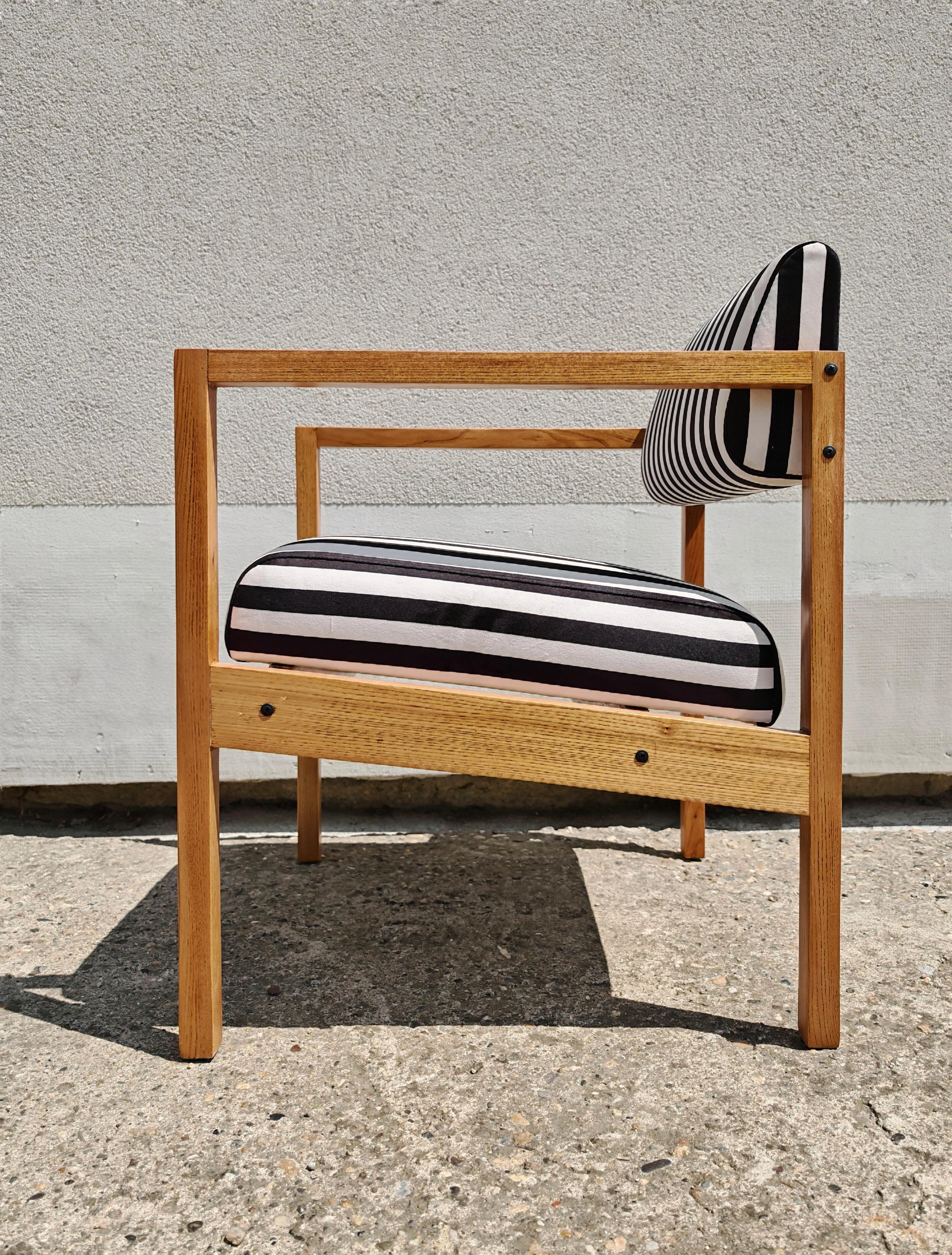 Pair of MCM Armchairs in solid Ash designed by Bernardo Bernardi, Yugoslavia For Sale 1