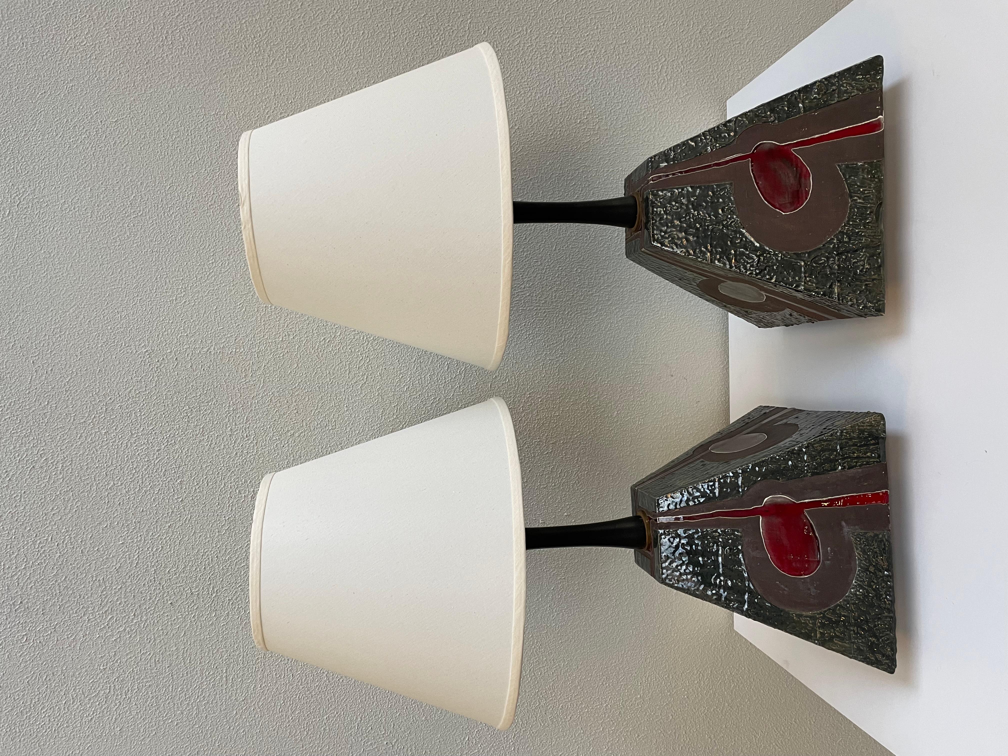 Beautifully detailed pair of MCM Ceramic Brutalist table lamps. Shade included. 

Measurements including lamp shade at 16 x 16 inches.