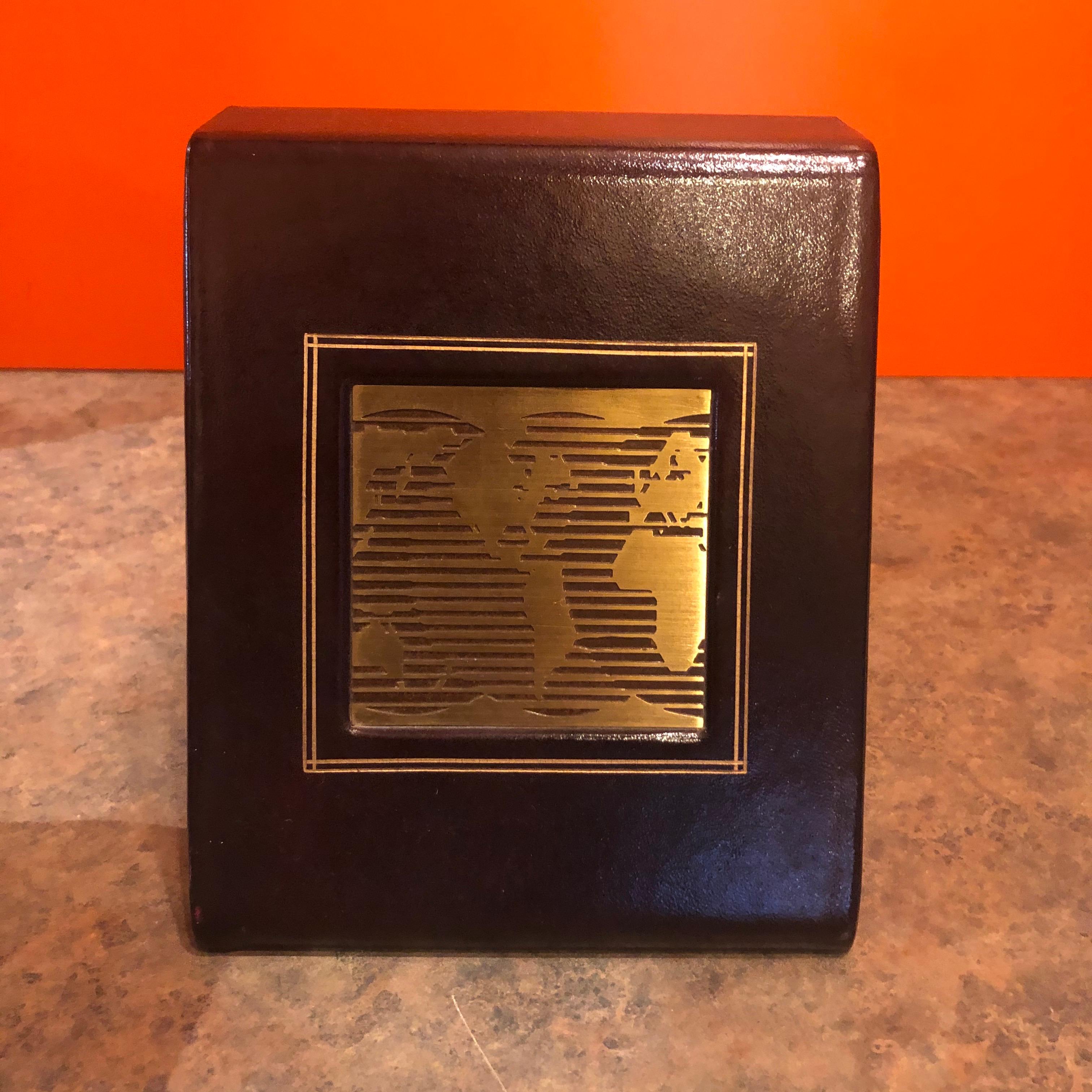 Pair of MCM Leather Wrapped World Map Bookends In Good Condition For Sale In San Diego, CA
