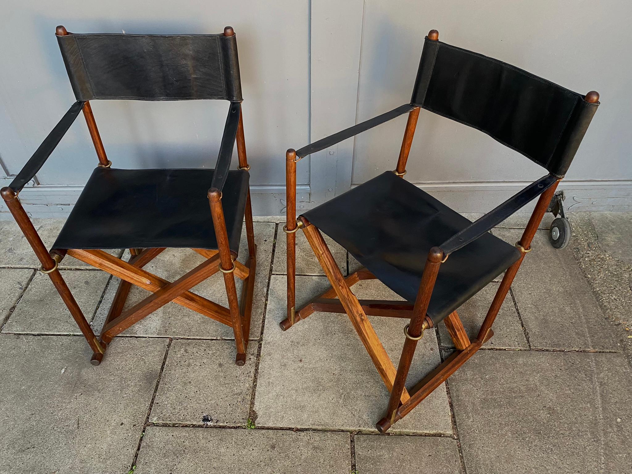 Mid Century Pair of Mogens Koch ‘Mk-16’ Safari Chair, Folding Directors chair, Danish, 1970s

Pair of vintage leather & teak folding Safari Chairs, Model ‘MK 16 Safari’ originally designed by Mogens Koch in 1932, reproduced by various companies over