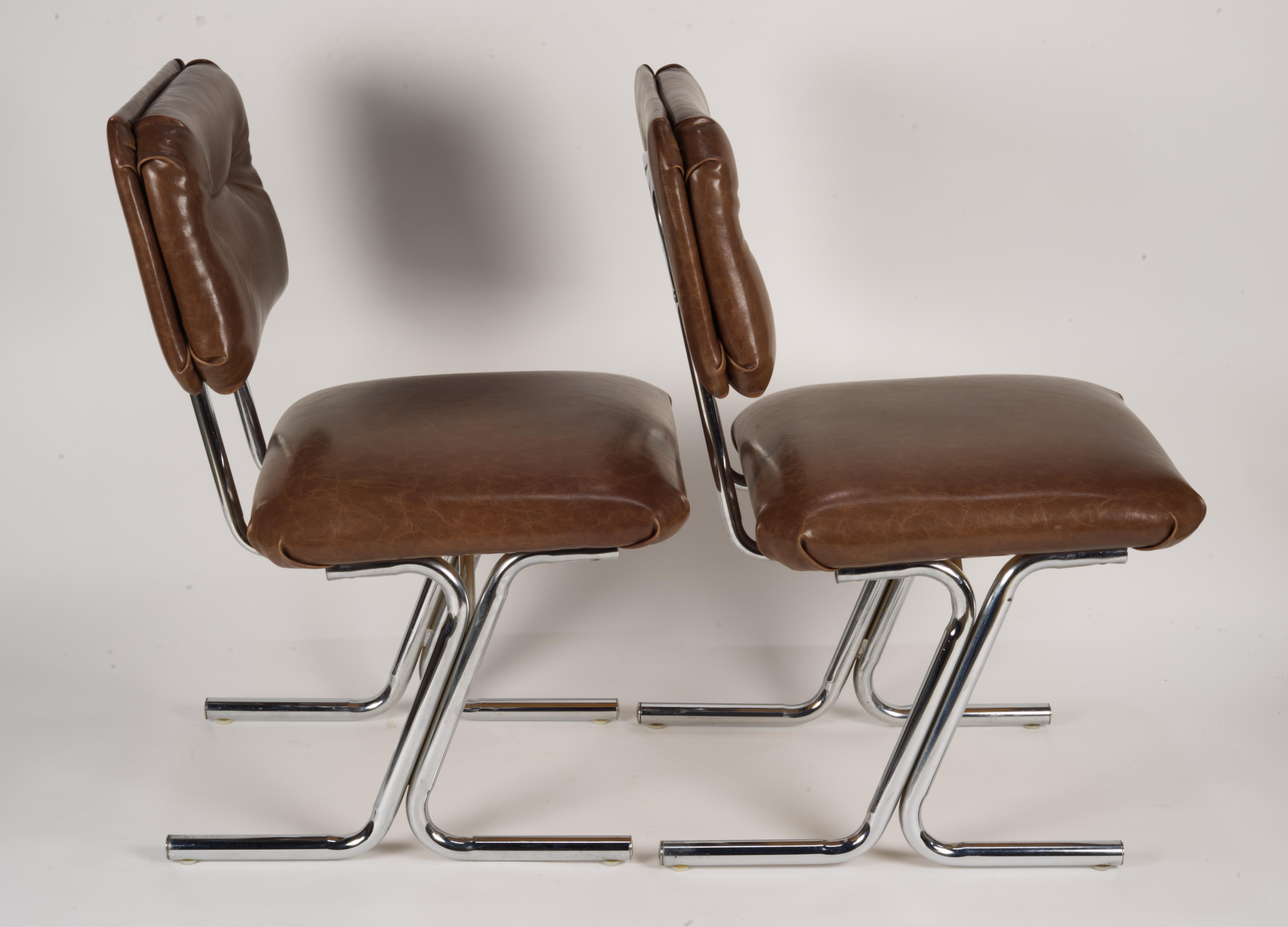 Mid-20th Century Pair of MCM side chairs in steel and brown vinyl.  For Sale